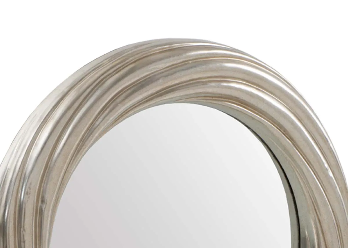 A round gold mirror from EZ Livings Gemma range. Closeup of gold textured trim.