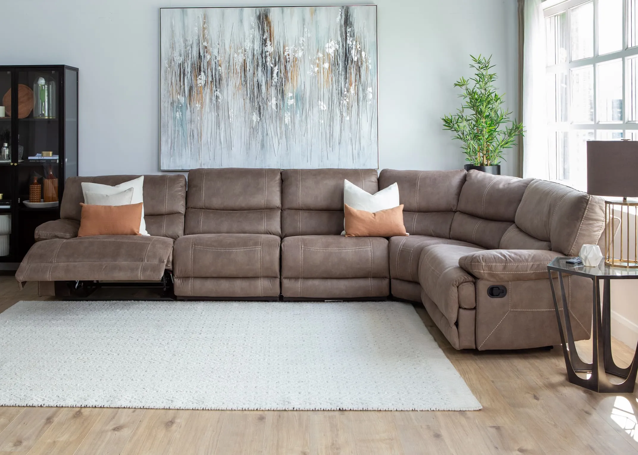 A lifestyle imange of the Baxter medium corner sofa with armless unit added to small