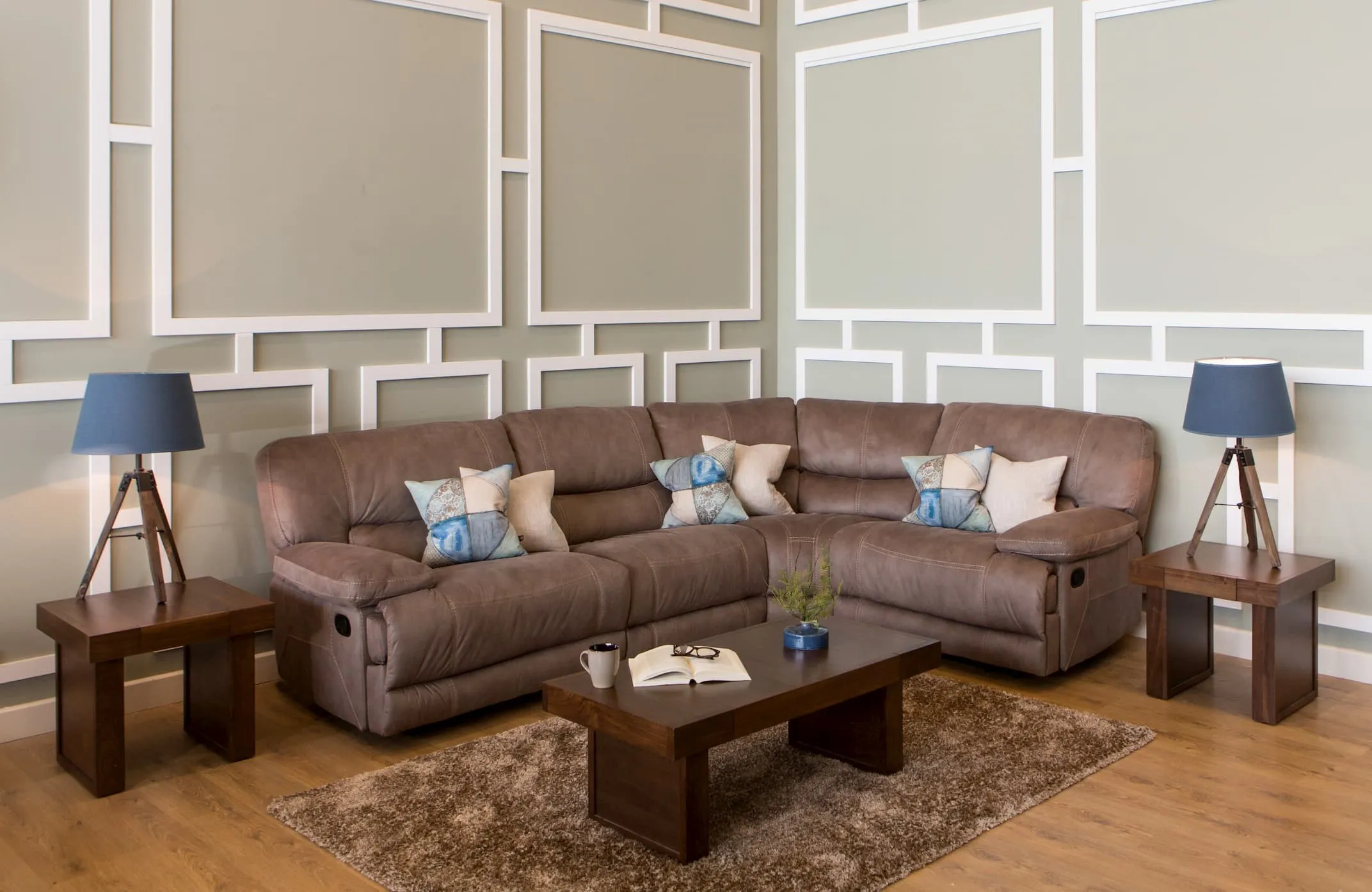 A lifestyle image of Baxter Taupe Fabric Armless Sofa