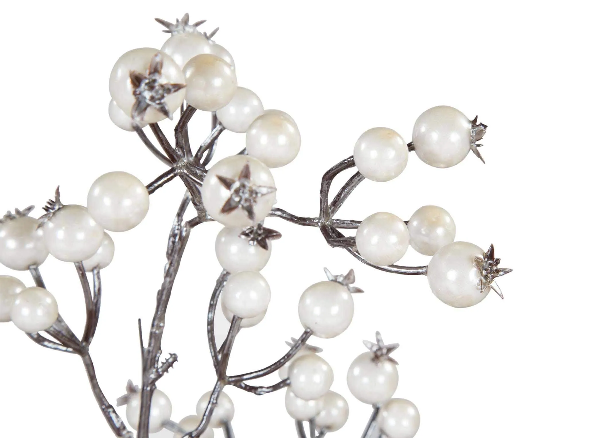 A close up shot of the Christmas Pearl highlighting the white pearls.