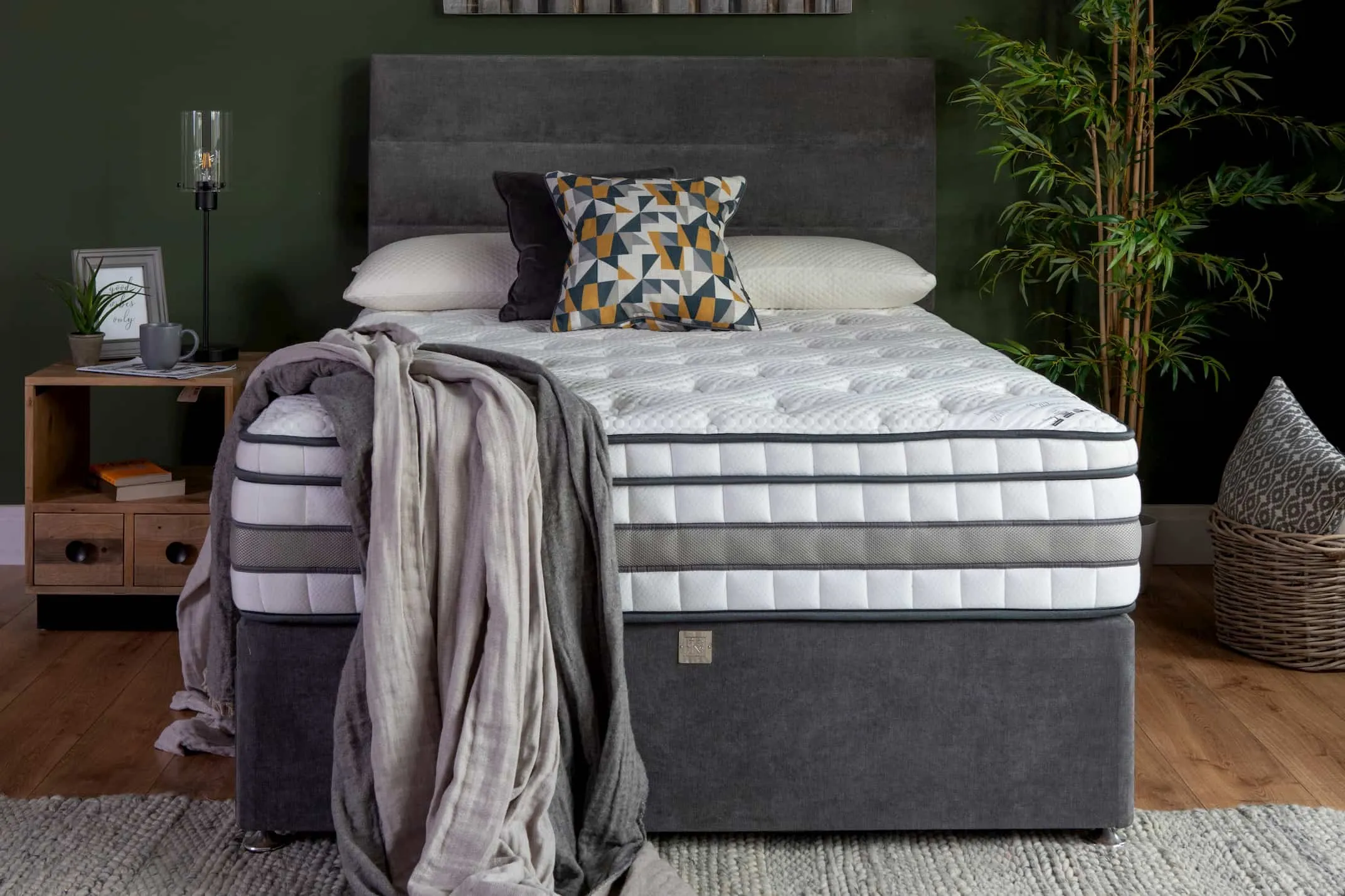 A lifestyle image of the 3 feet single Cashmere mattress including a grey bedframe.
