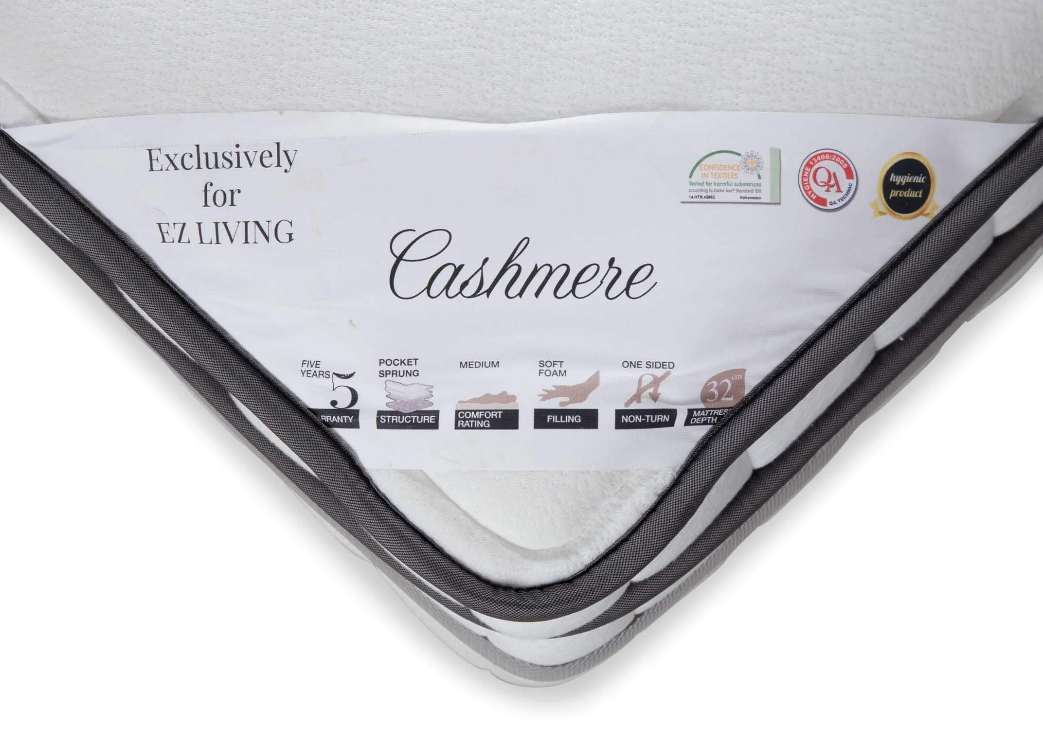 A close up showing the tag on the Cashmere 5 foot king size mattress with various details.