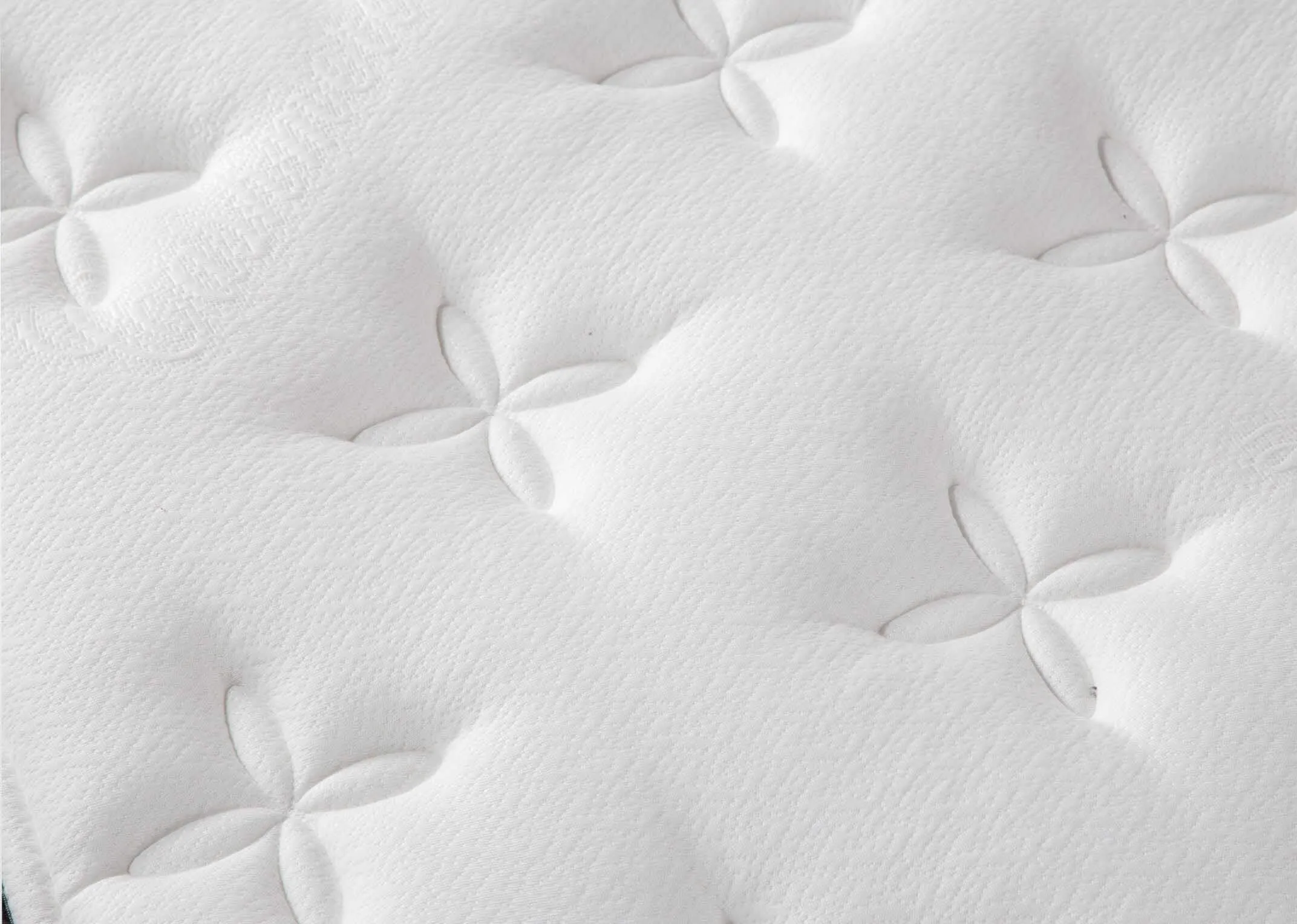 A lifestyle image of the 6 feet superking size white Cashmere mattress with Venice base & chevron locker and chest.