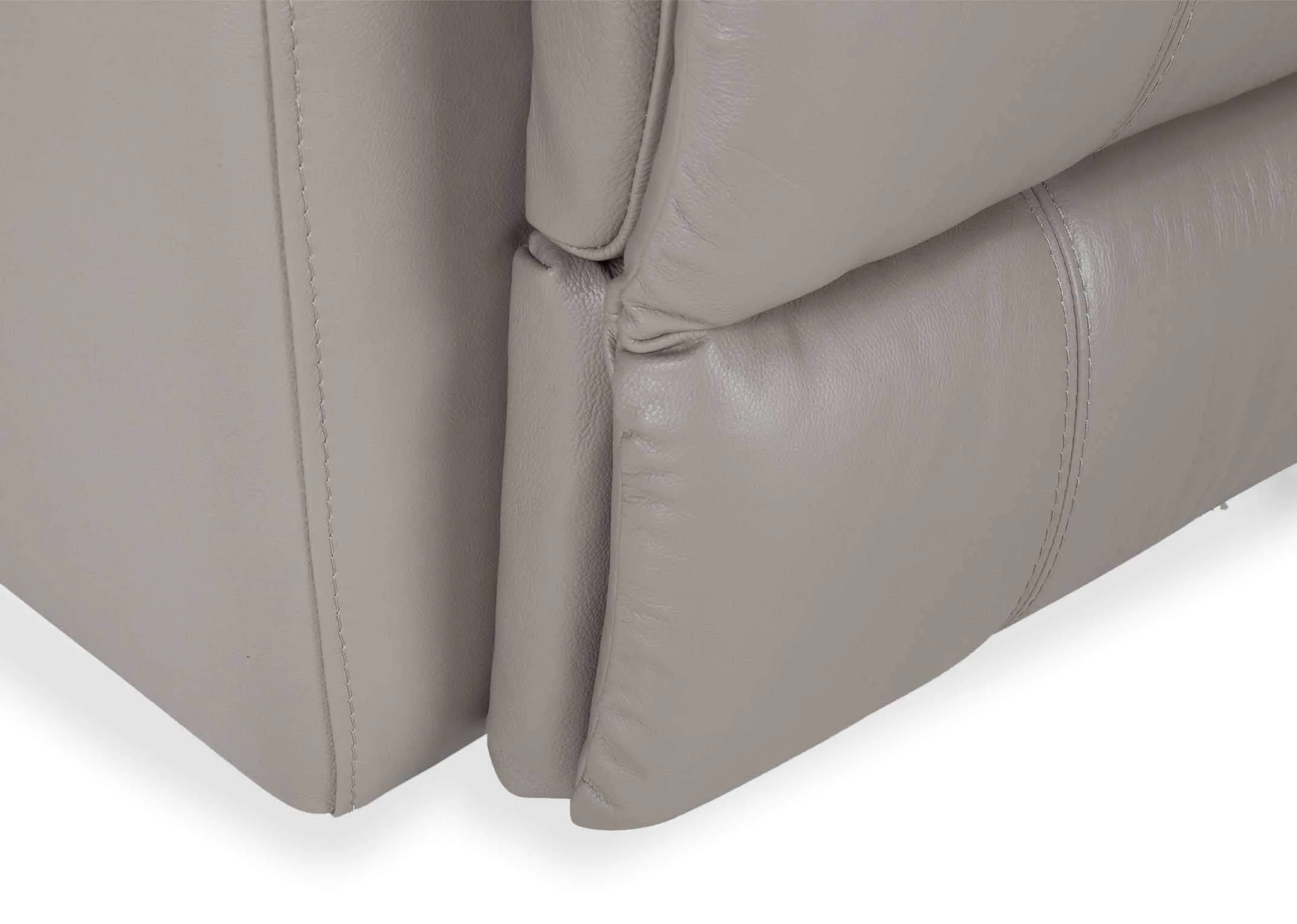 A 3 Seater reclining sofa in soft grey leather from EZ Living Furnitures Groove range. Closeup button.