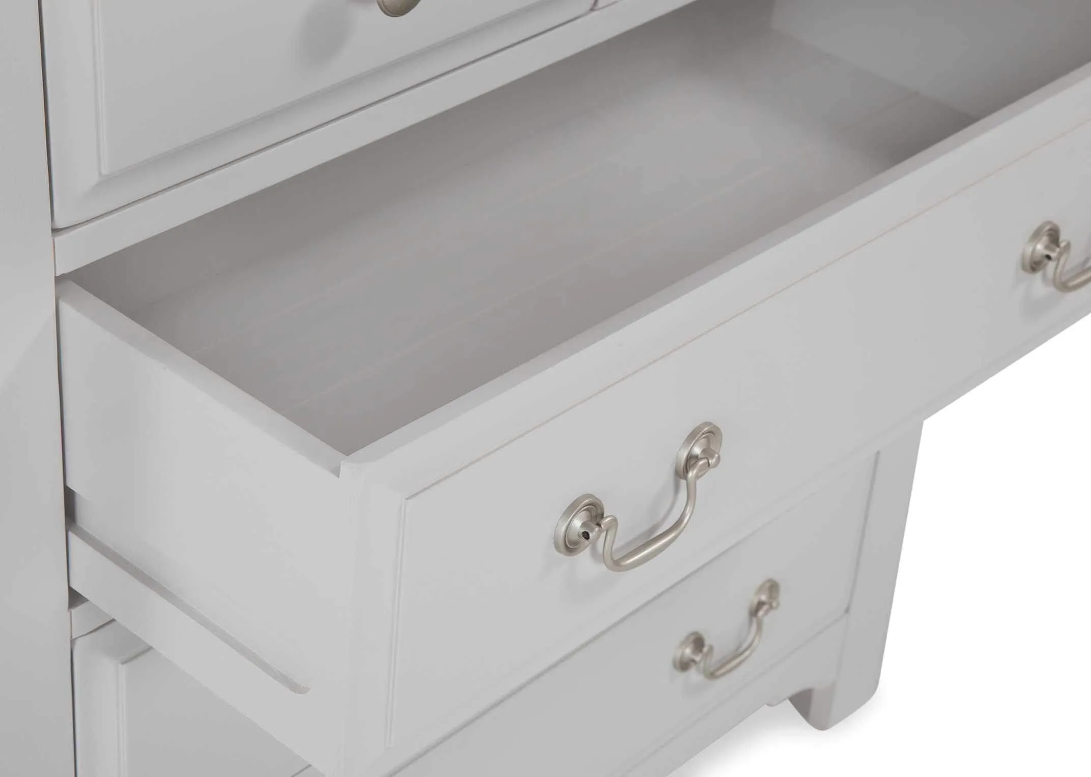 Open drawer view of two over three grey oak Georgia chest of drawers with metallic handles
