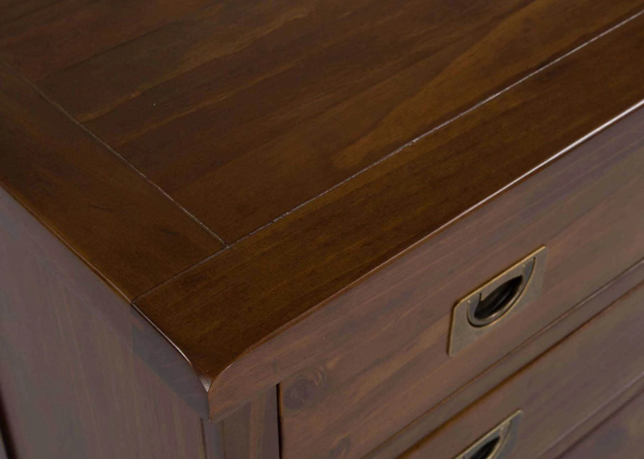 Detailed view of top of five drawer dark solid wood classic chest Aisling