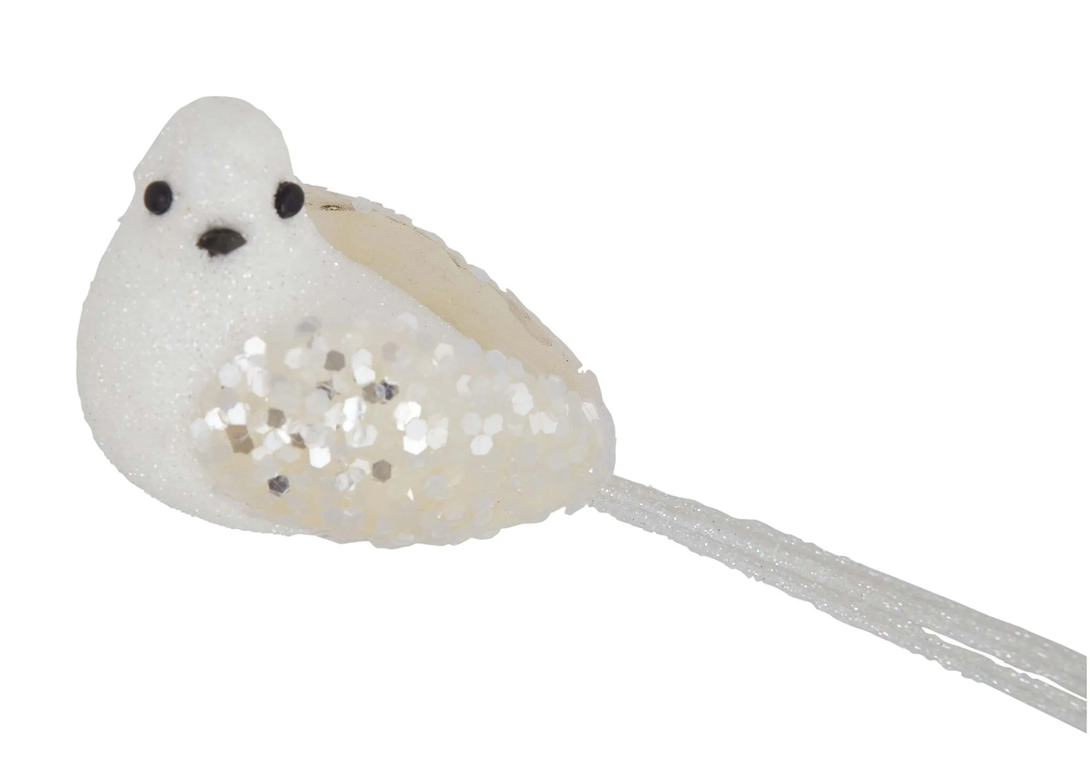 A close up looking at the face of the white bird with glitter wings christmas decoration.