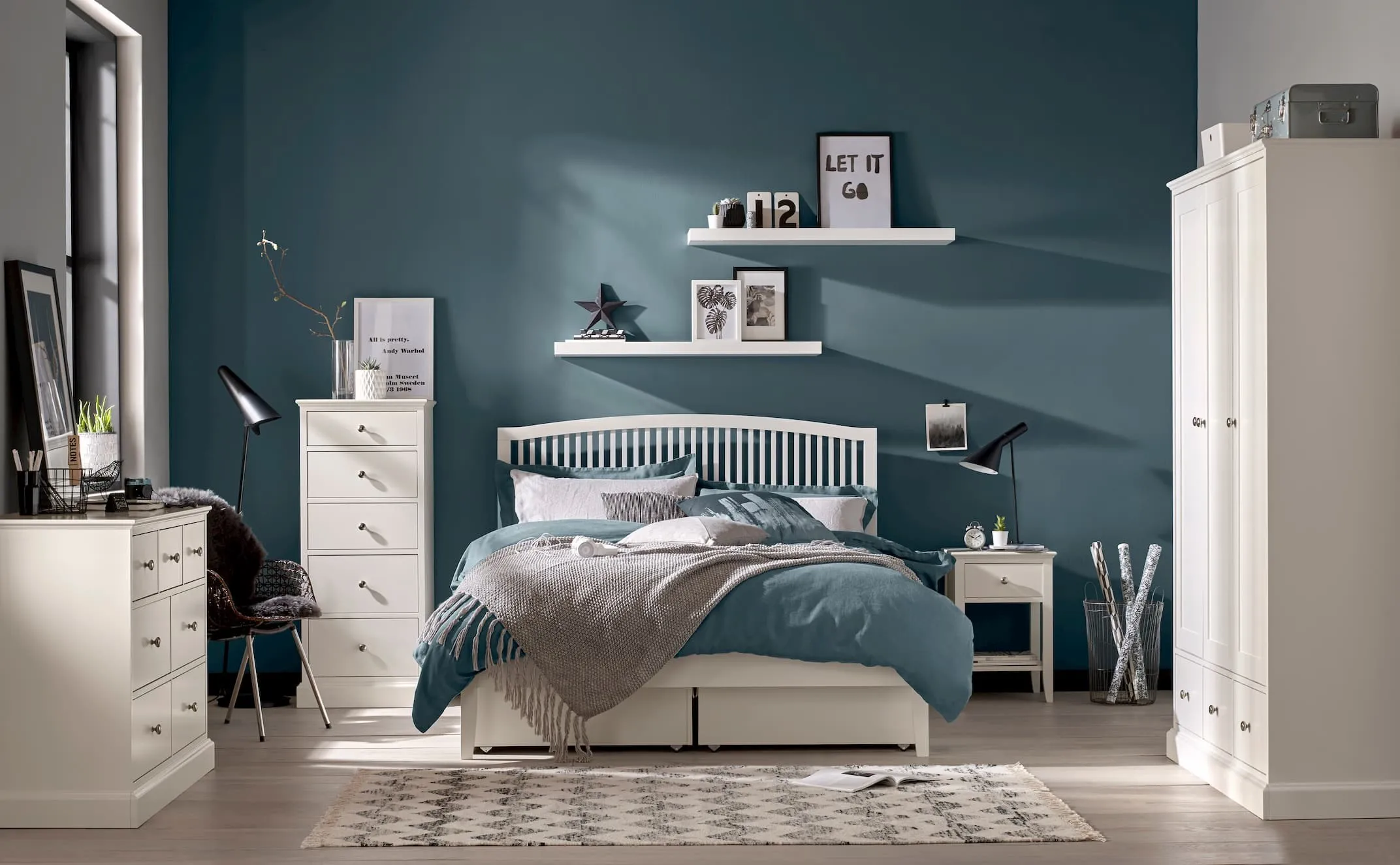 A lifestyle image of the Rivendale White Bedroom range with the wardrobe to the side.