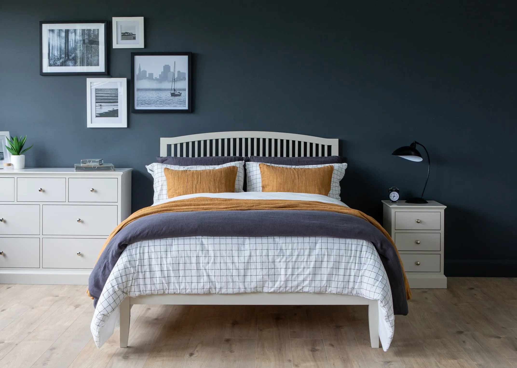 A lifestyle image of the grey 4ft rivendale bed with Chest & locker from EZ Living Furniture