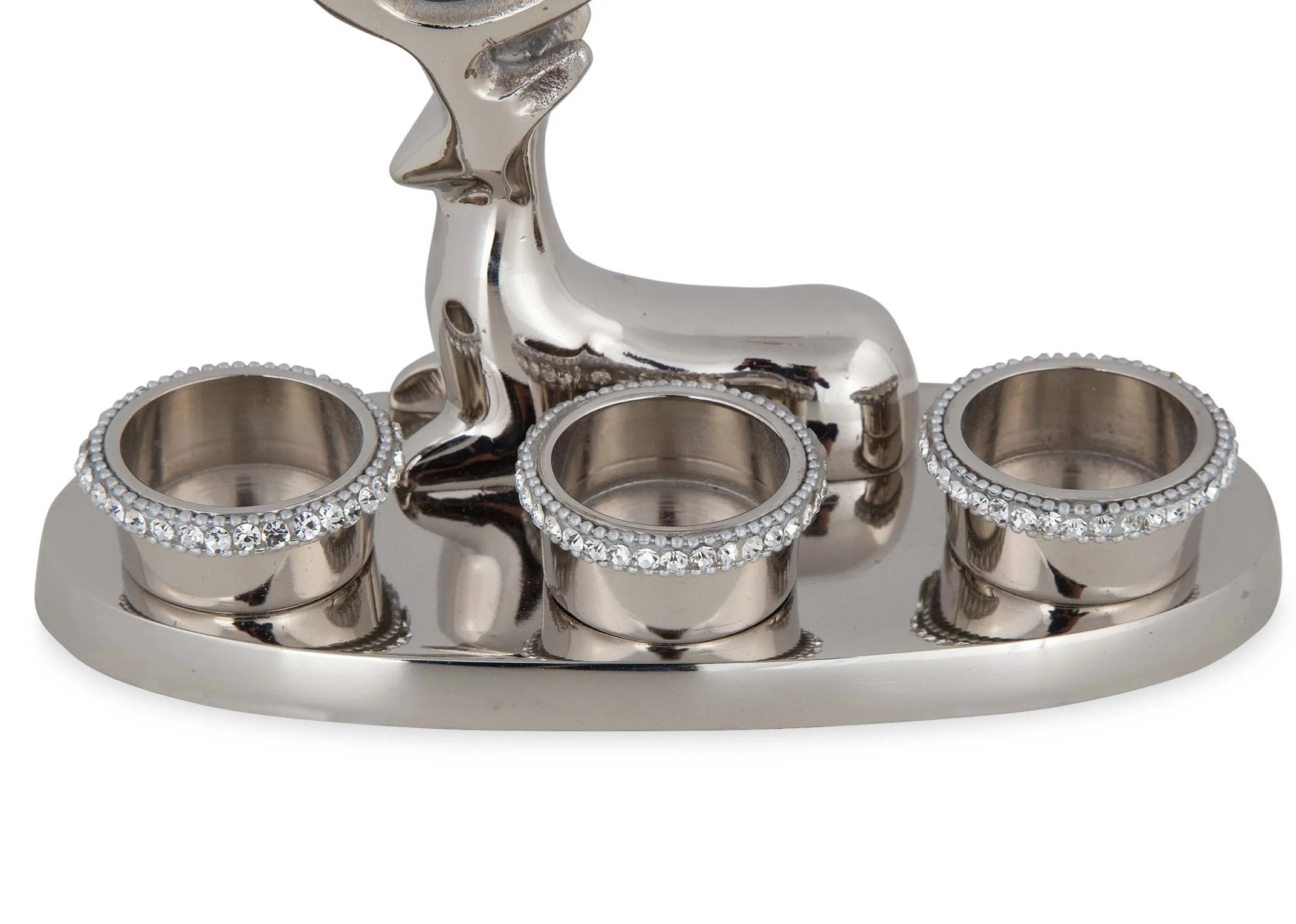 A close up of the candle holders highlighting the rhiestones embededded around the edges.