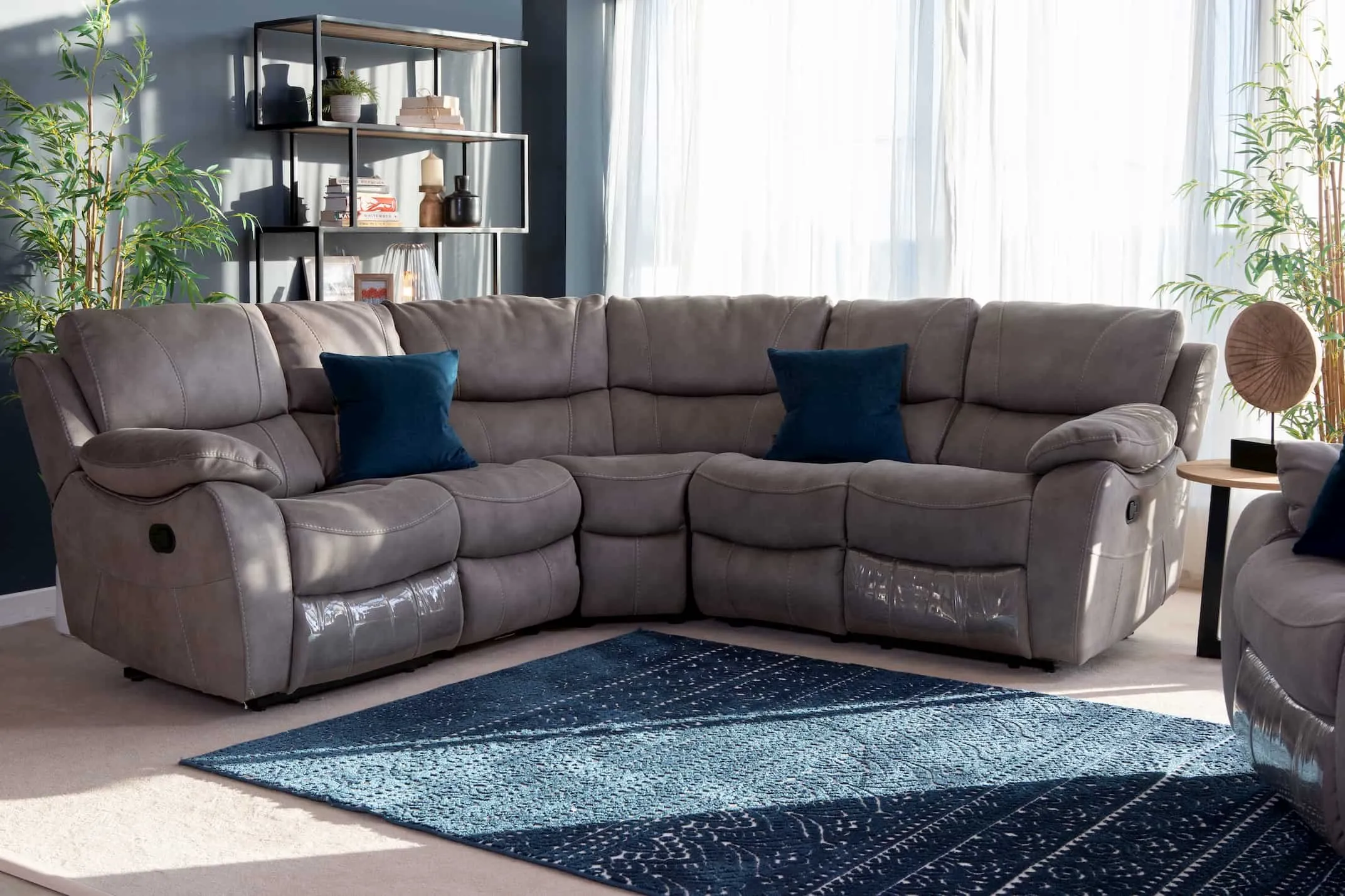 Large Corner Sofa in sultry grey from EZ Living Furniture's Hannah range in a lifestyle image with Malta range.