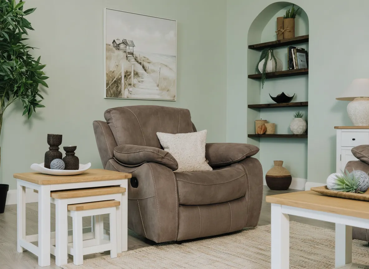 Detailed close-up of the armrest and seat of the Hannah grey faux suede fabric reclining armchair
