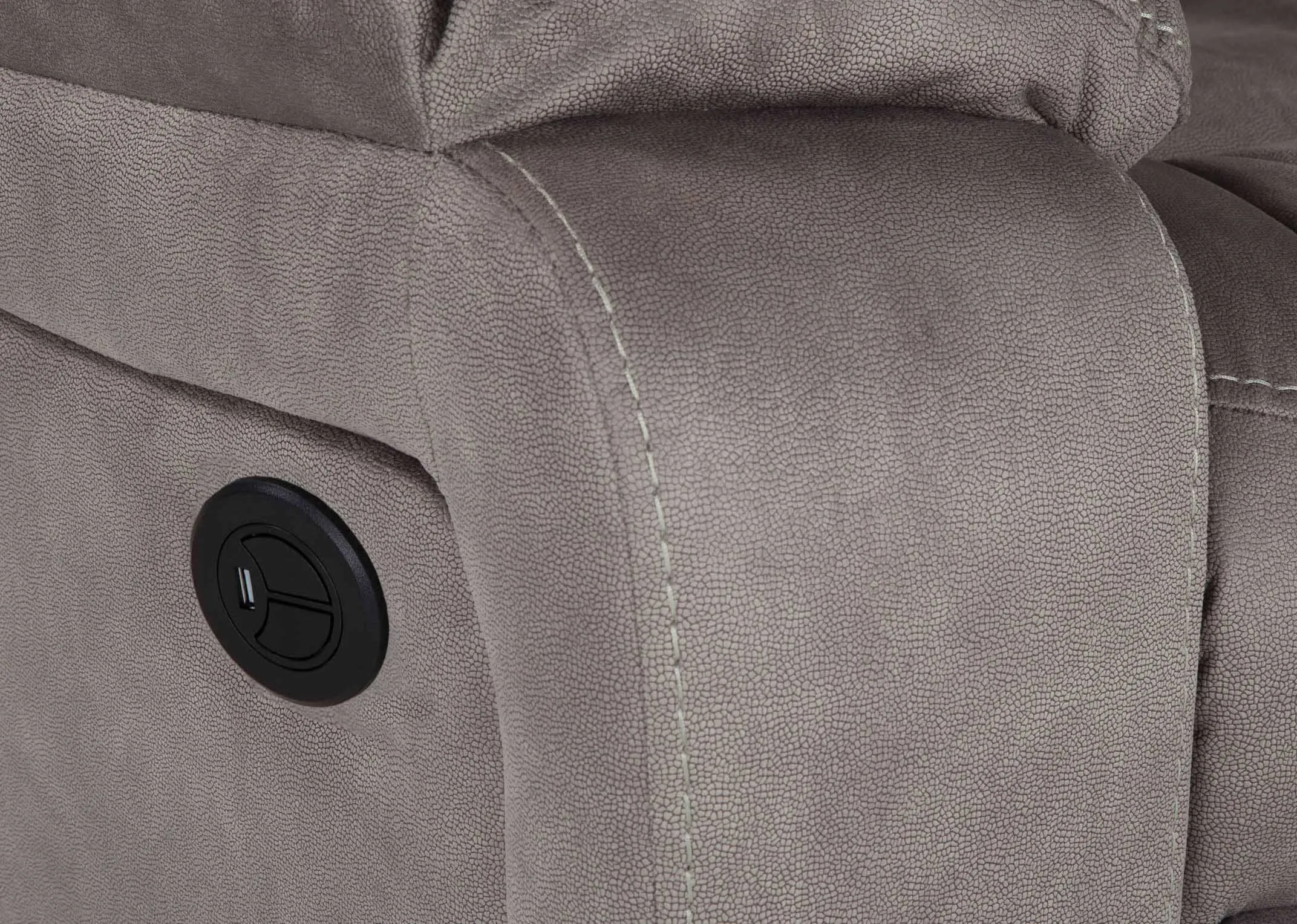 Detailed close-up view of the black reclining button from the Bradford 3 seater grey suede power reclining sofa
