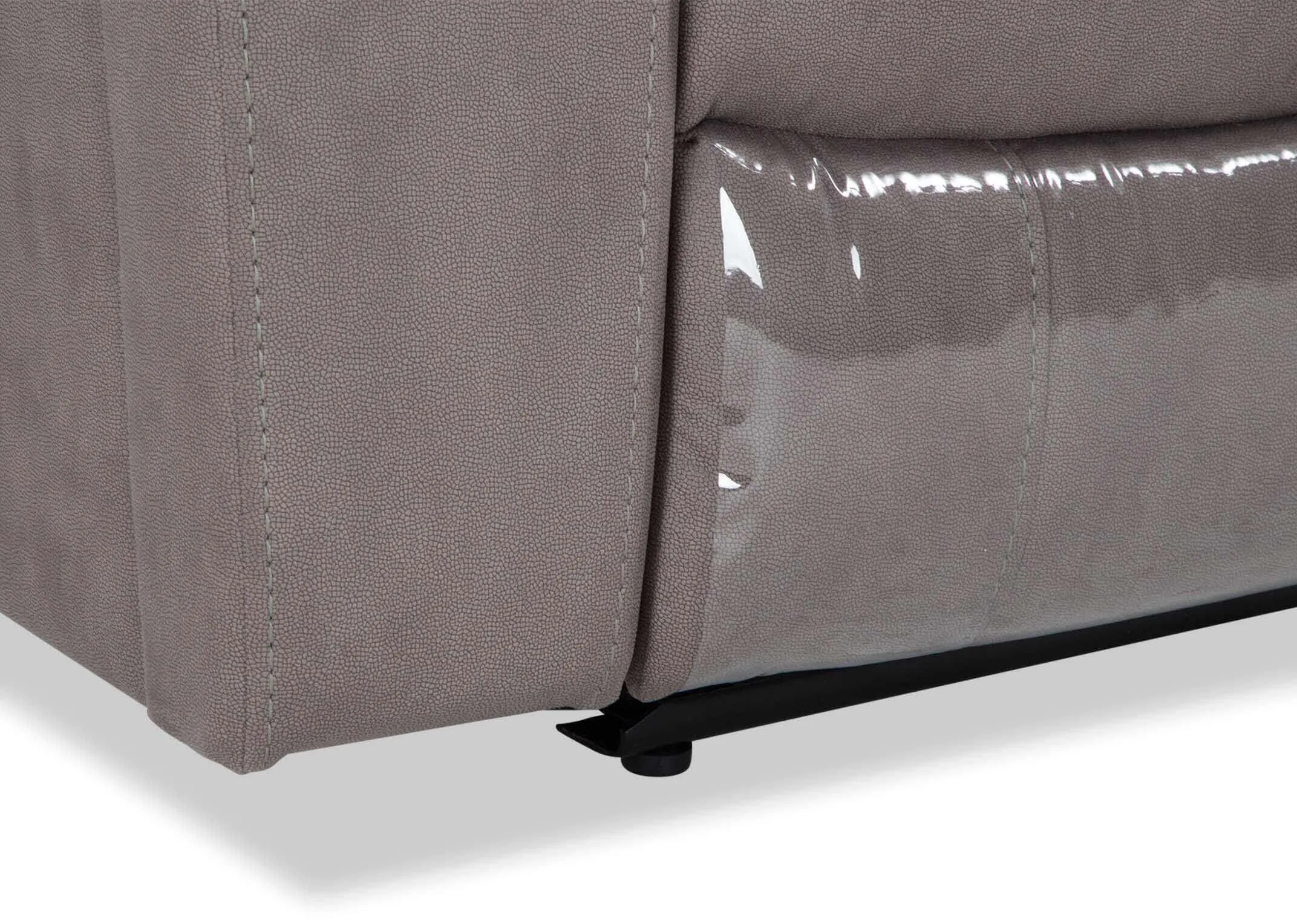 Detailed close-up view of the bottom corner of the Bradford 2 seater grey suede power reclining sofa