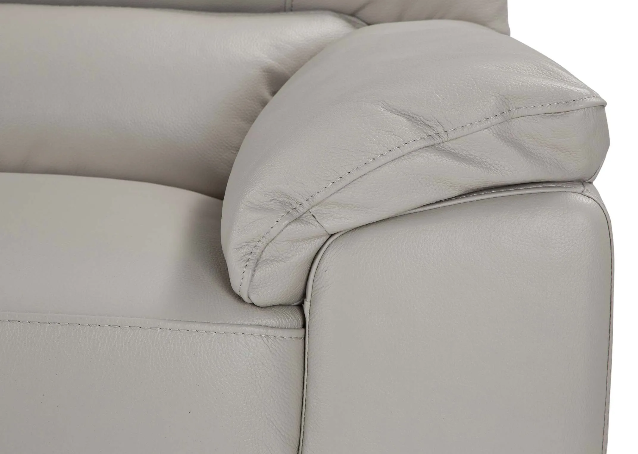 A close up of the armrest highlighting the light grey leather upholstery on the Alfredo 3 seater sofa.
