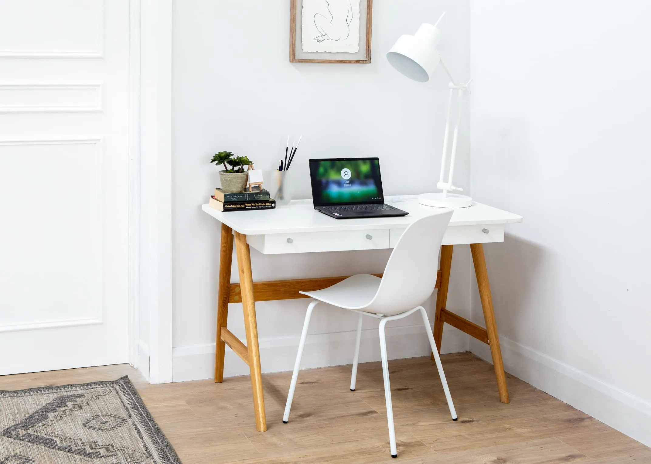 A dimension image of the Tia desk with Whitby chair and Babylon rug