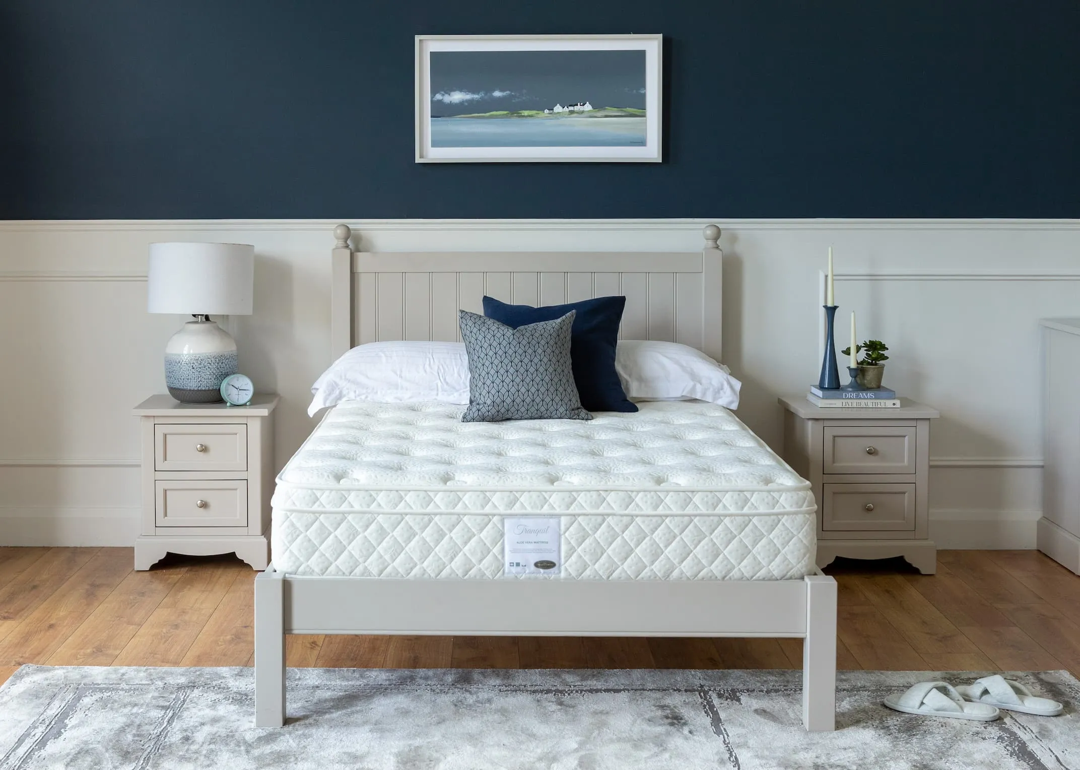 A lifestyle images of the Layla bedframe with lockers & chest & Tranquil mattress.