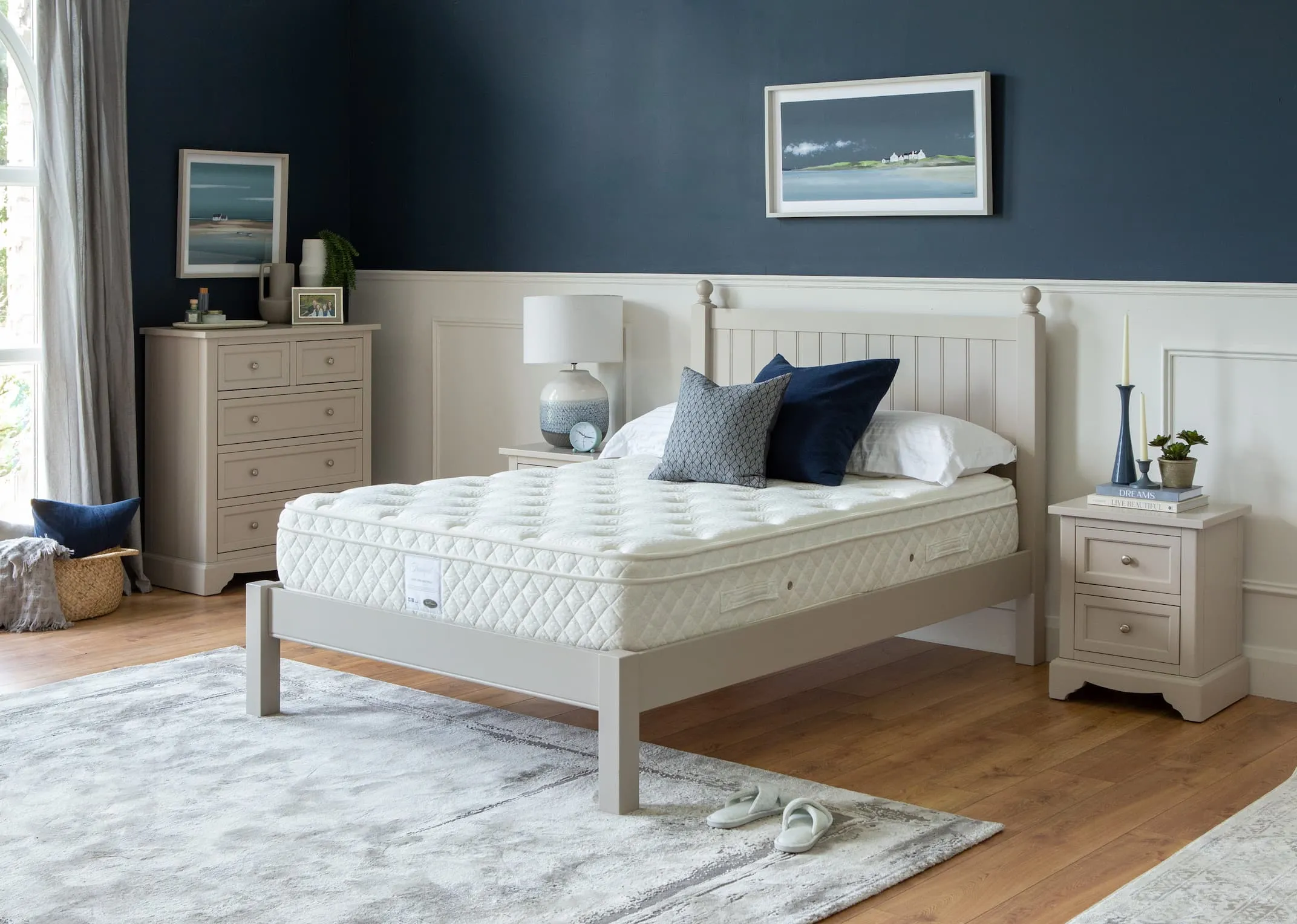 A lifestyle image of the Layla Bedframe with Tranquil mattress with layla lockers & chest