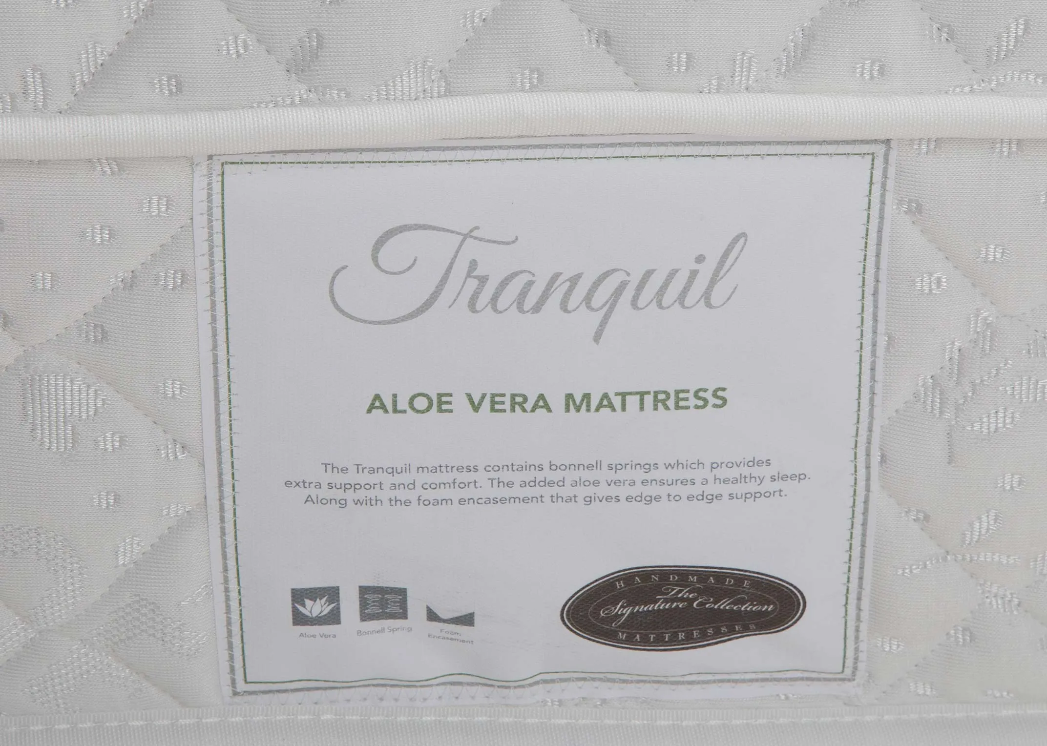 A close up of the tag on the Tranquil 4 ft mattress with various details listed.