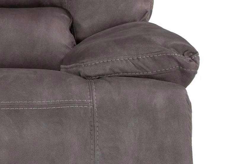 A close up view of the armrest on the sultry grey power reclining Baxter armchair
