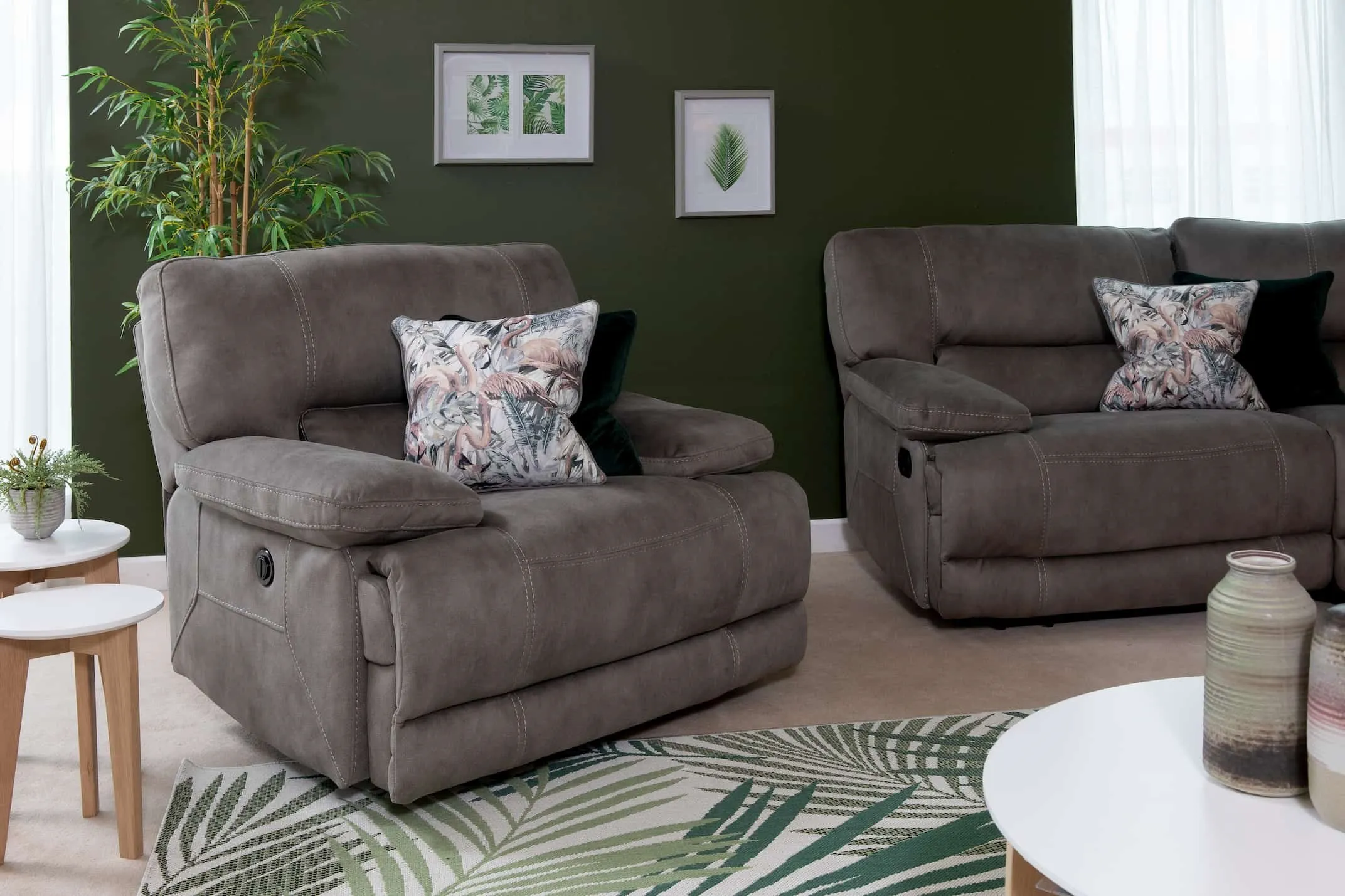 A lifestyle image for the Baxter Grey Recliner with the rest of the range available at EZ Living Furniture.
