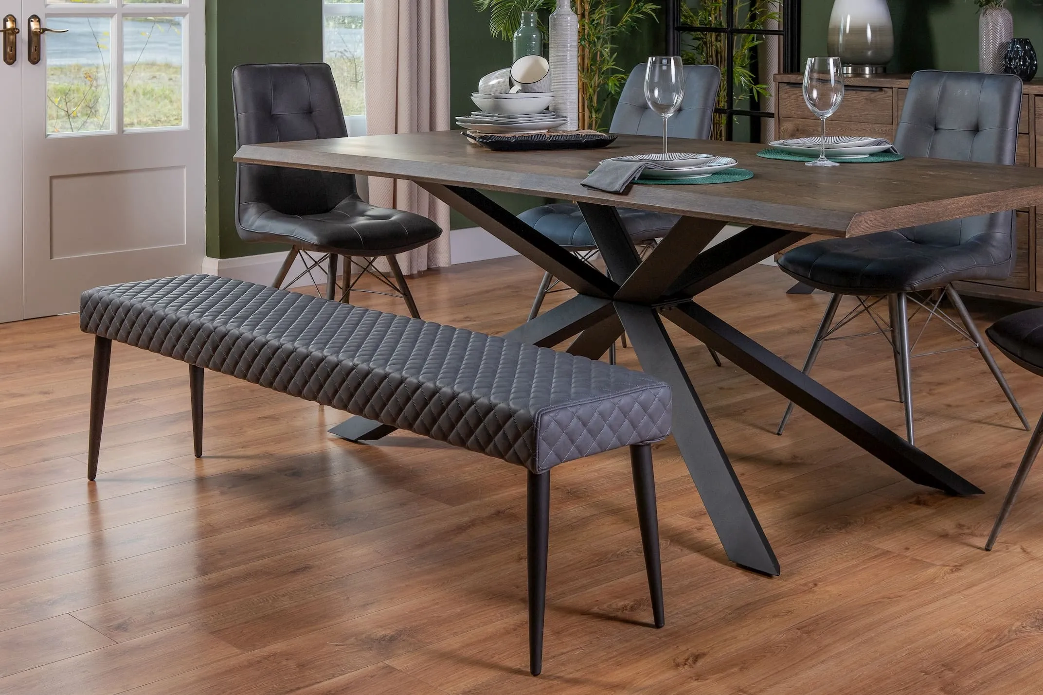 A shot of a grey dining bench from EZ Living Furniture's Ottowa range. Lifestyle.