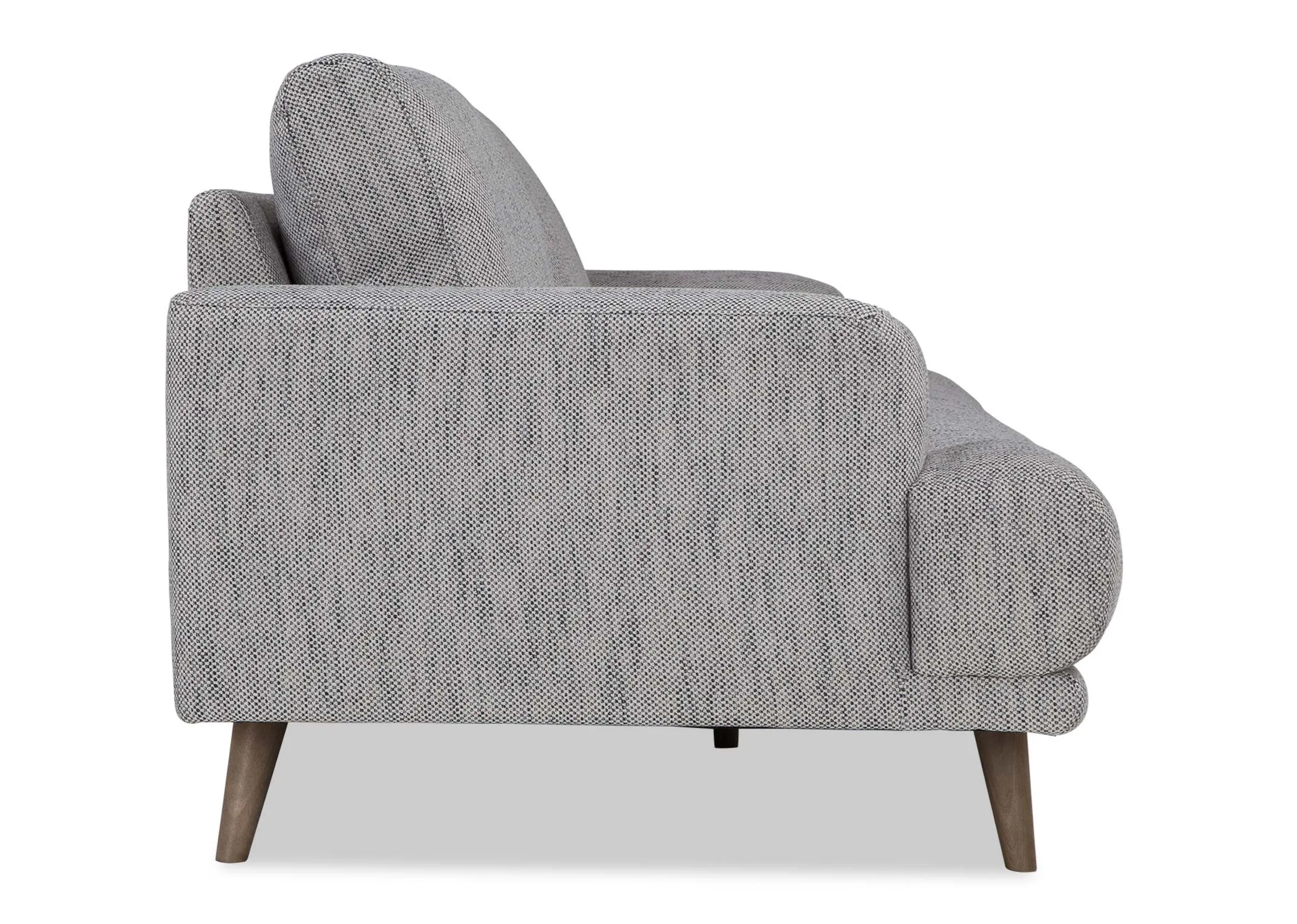 A view of the side of the Legend 3 seater sofa in grey fabric.