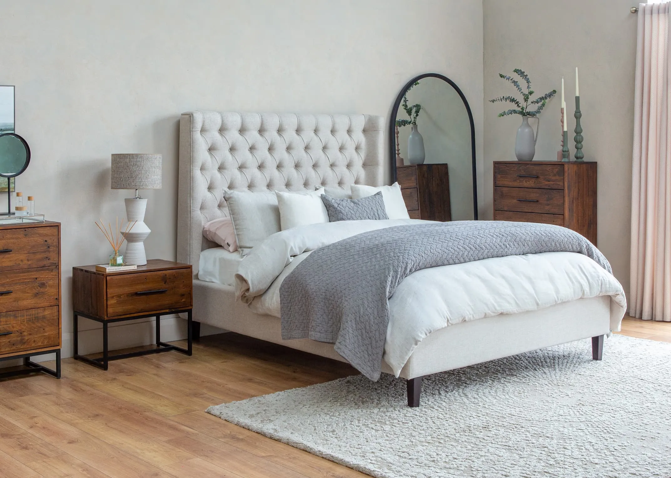 A lifestyle image of the Chelsea Linen Bedframe with Chicago Chest