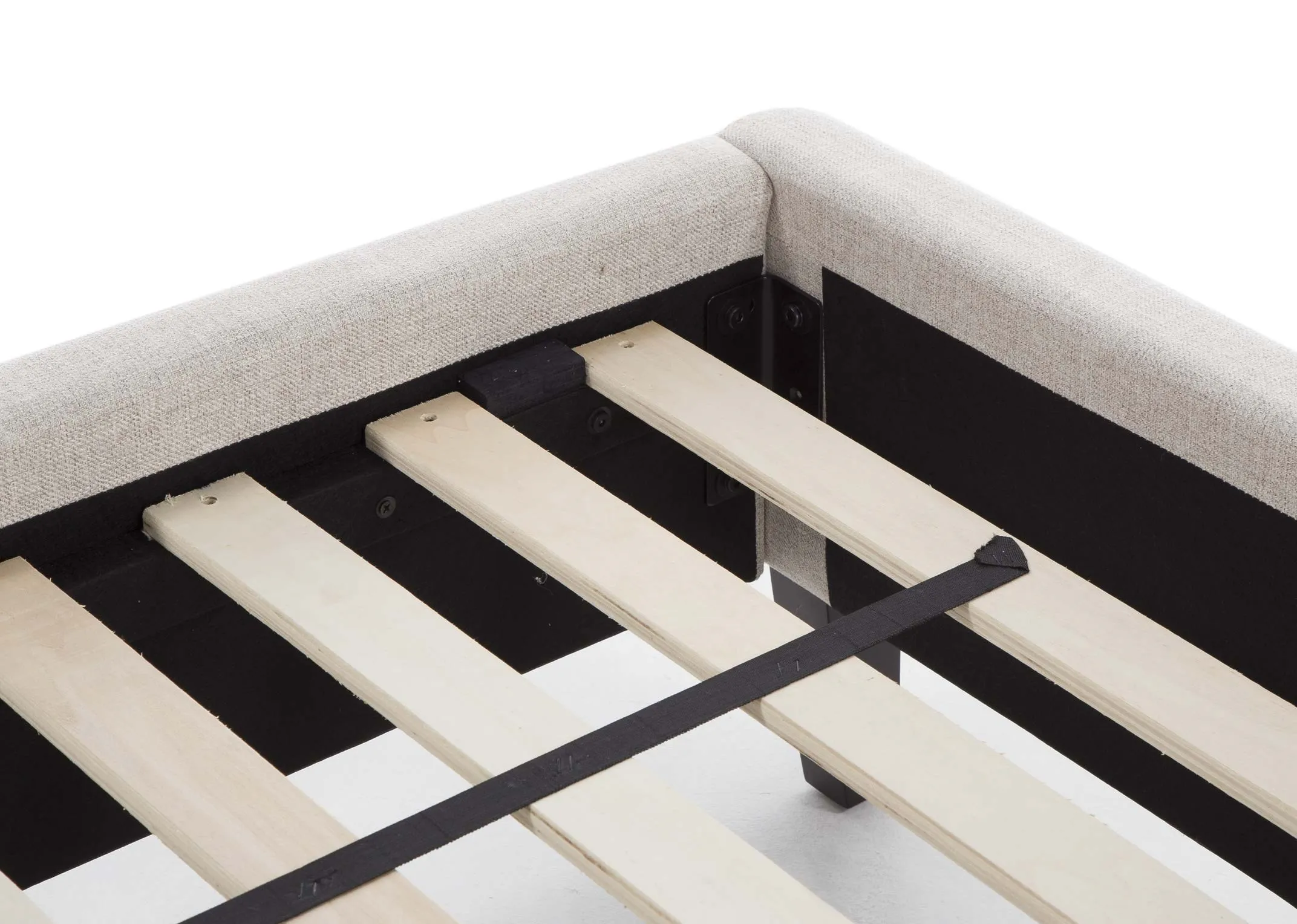 A view from behind looking at the back of the beige fabric 6 ft Chelsea bedframe