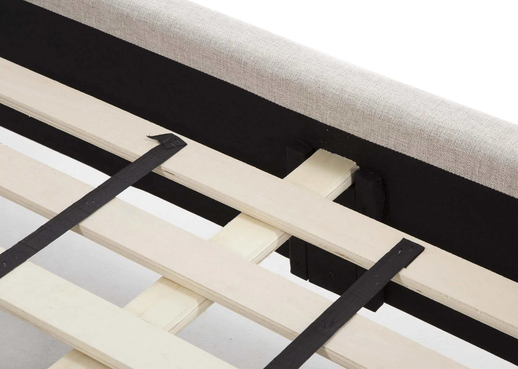 An image of the slats on the beige fabric 6 ft Chelsea bedframe