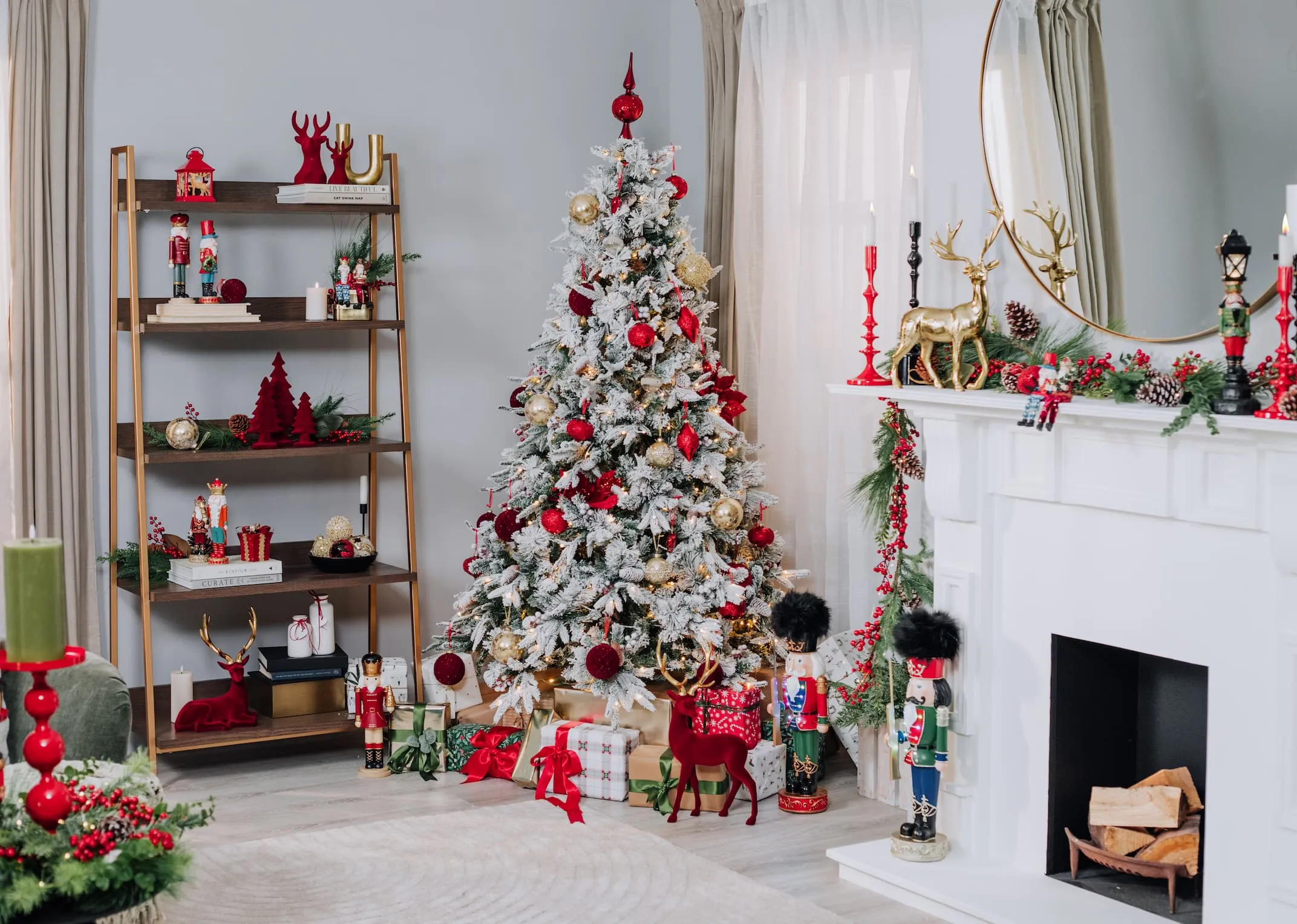 A lifetsyle image of the Vermont 8ft tree with snow & Nutcrackers theme including Fur Hats beside tree.