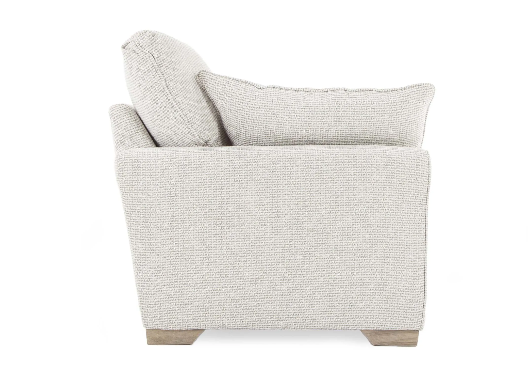 Sader Beige Fabric Accent Armchair in an image taken from the side showing depth