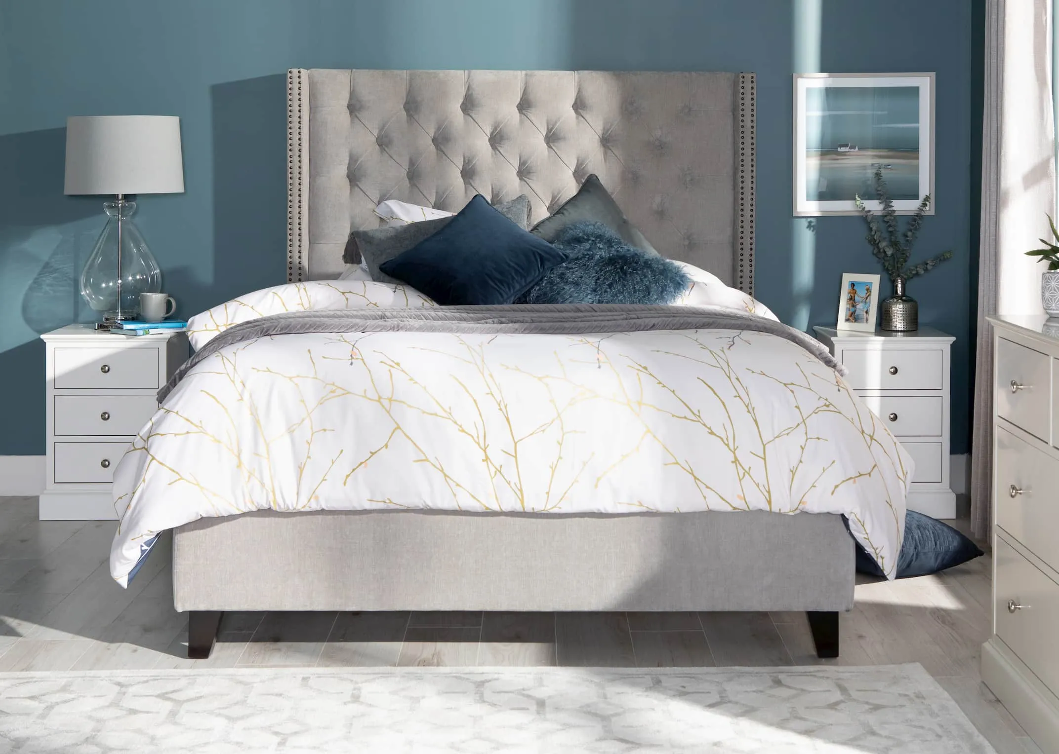 A lifestyle image of the Encore Bed with Bree lamp & Rivendale furniture with the Ulyana Hammond's Azure print.