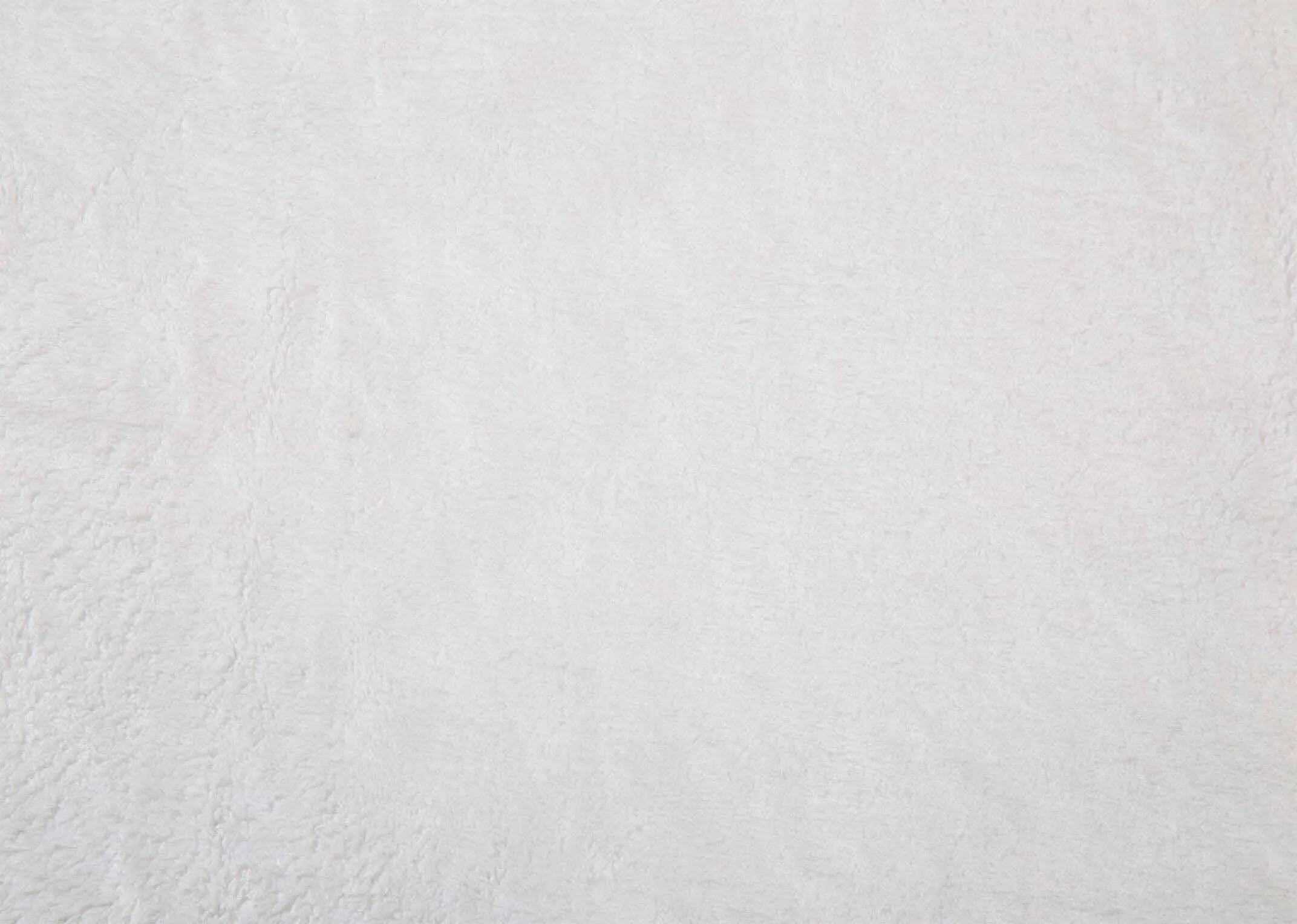 A luxury mattress protector in King Size (5ft) on a mattress from EZ Living Furniture's Guardsman range. Closeup of fabric