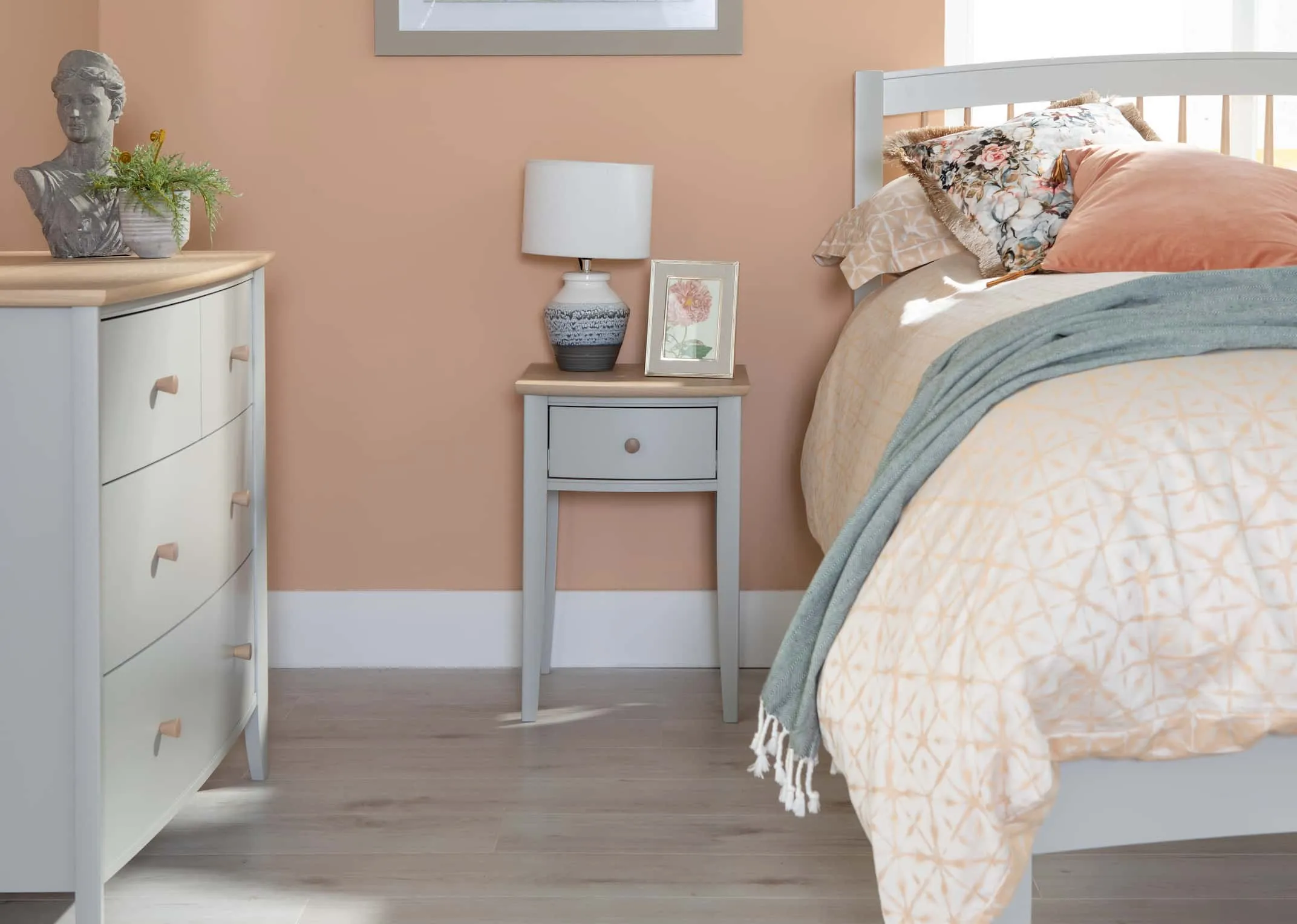 A lifestyle image of the Whitby Bedroom range including locker with Moy lamp