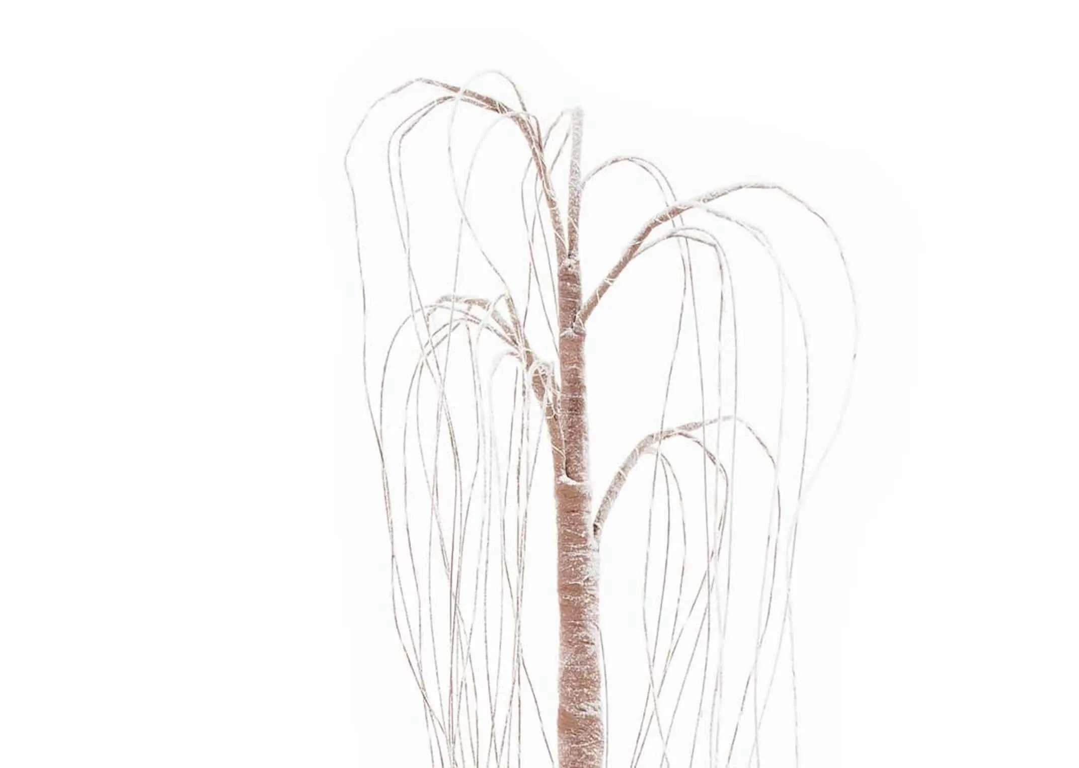 A decorative willow tree with 300 LED lights from EZ Living Furnitures Christmas trees. Closeup of branches lights off