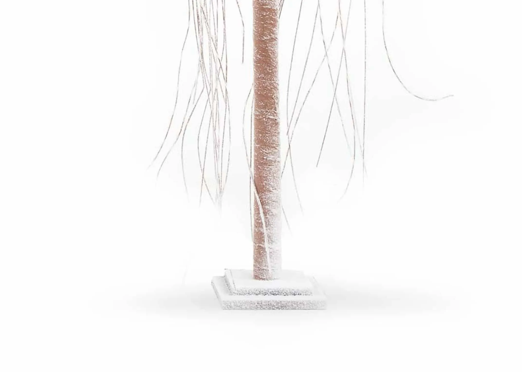 A decorative willow tree with 350 LED lights from EZ Living Furniture's Christmas trees. Closeup of branches lights off