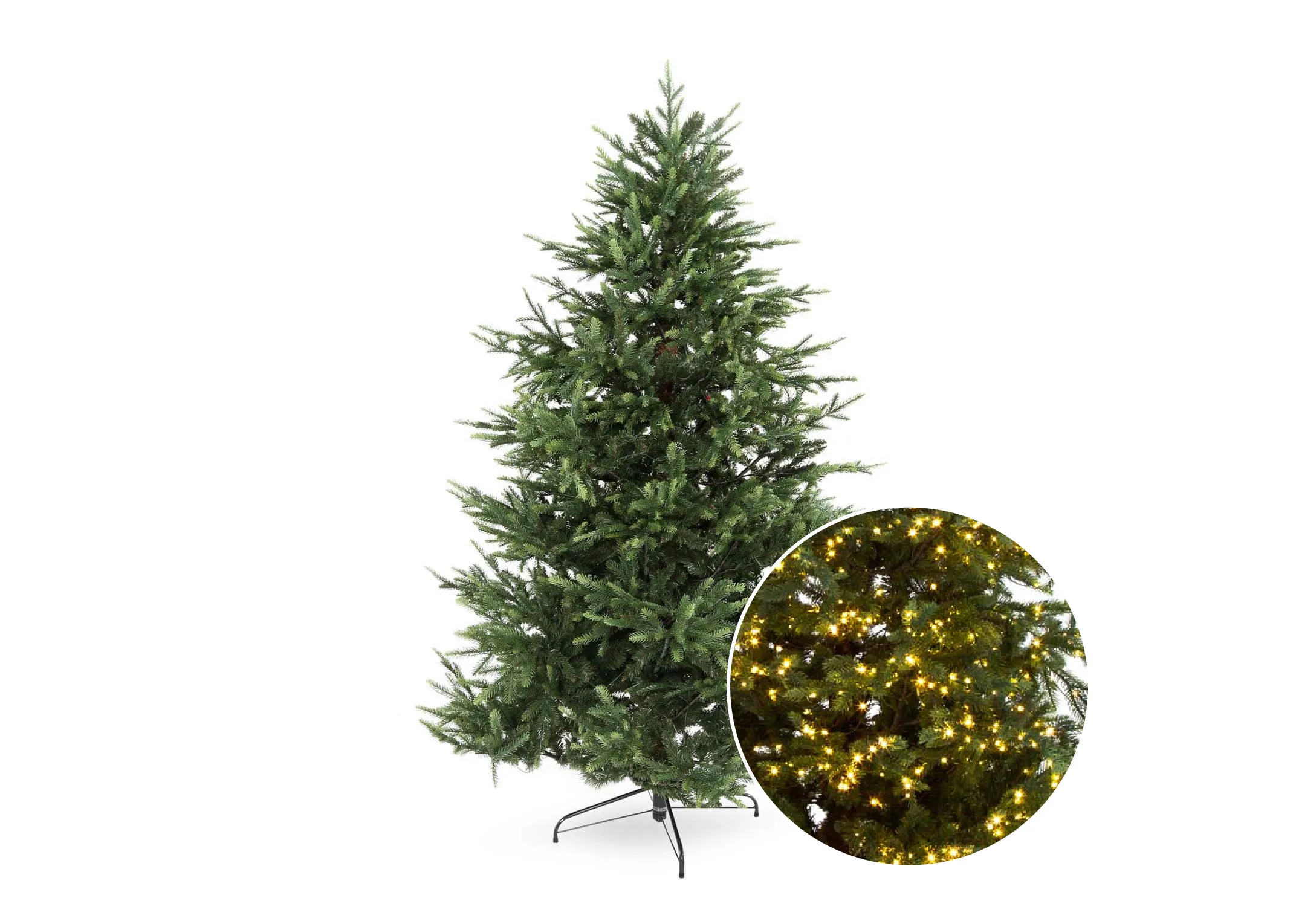 An 7ft pine green Christmas tree on a stand with 3000 lights on from EZ Living Furniture's Rockefeller range. Closeup of lights on tree lit