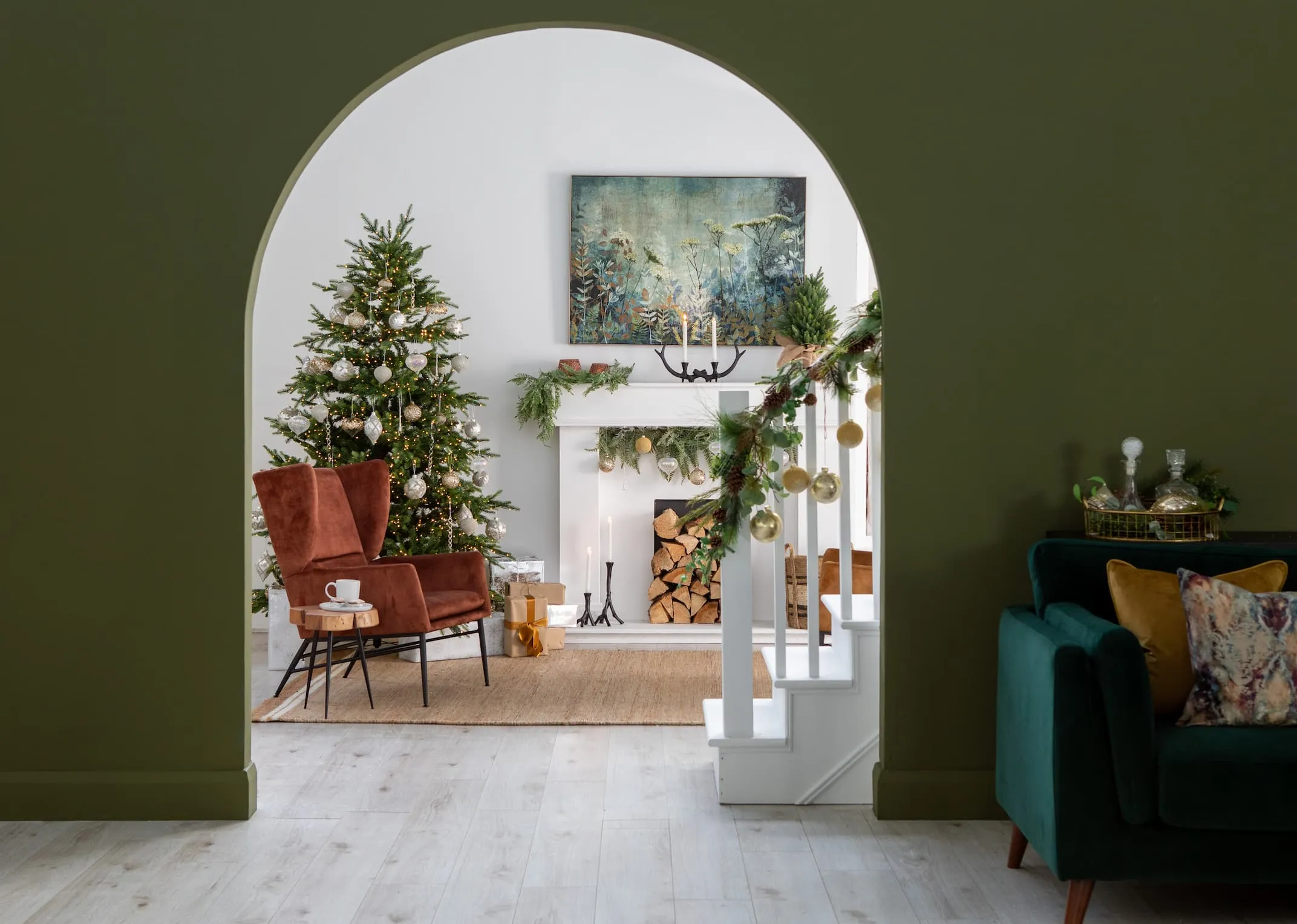 An 8ft green Christmas tree on a stand from EZ Living Furniture's Rockefeller range. Front view of tree crown.