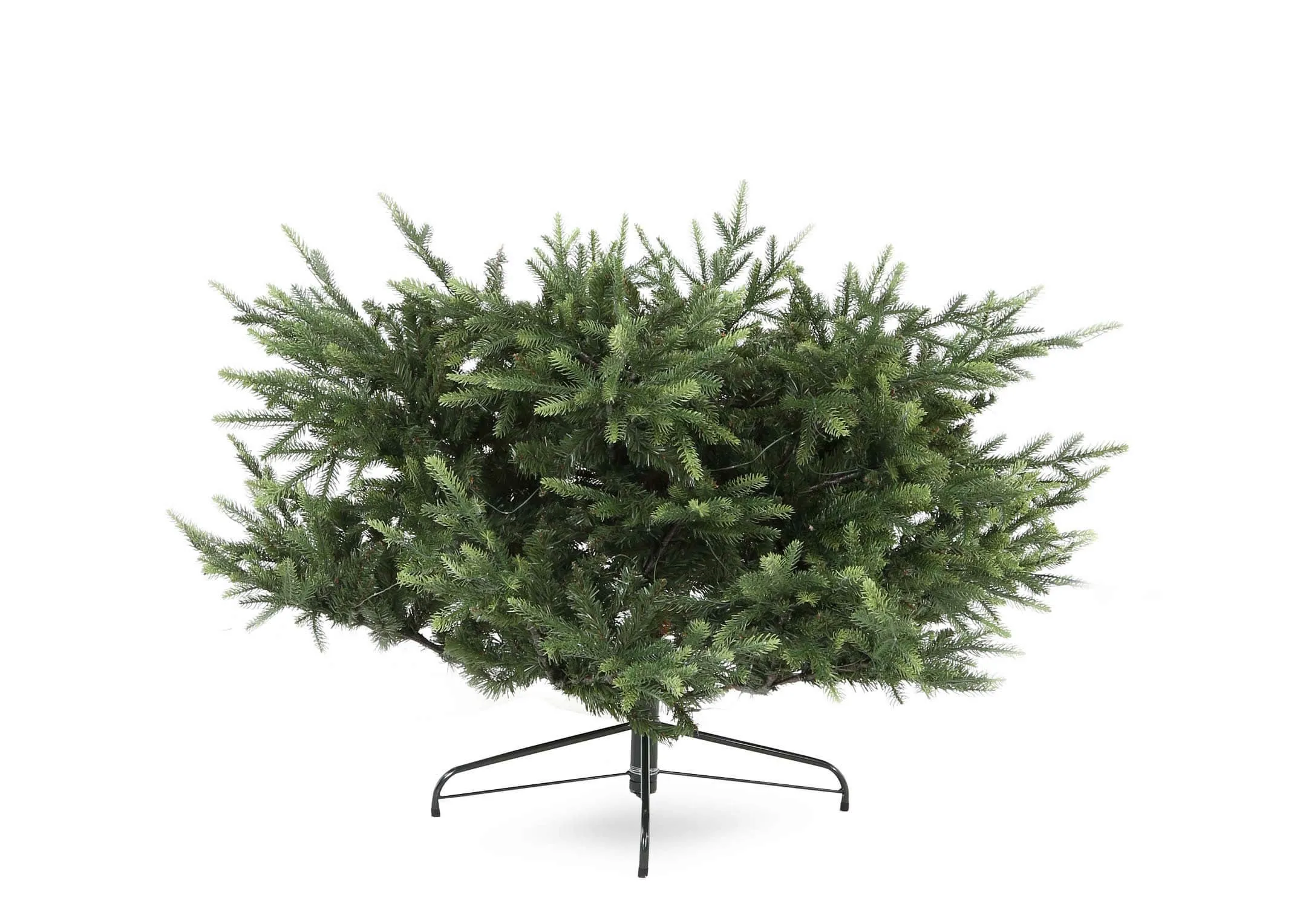 A lifestyle image of the Rockefeller Tree with Boston Armchair & fanciful print in an archway shot