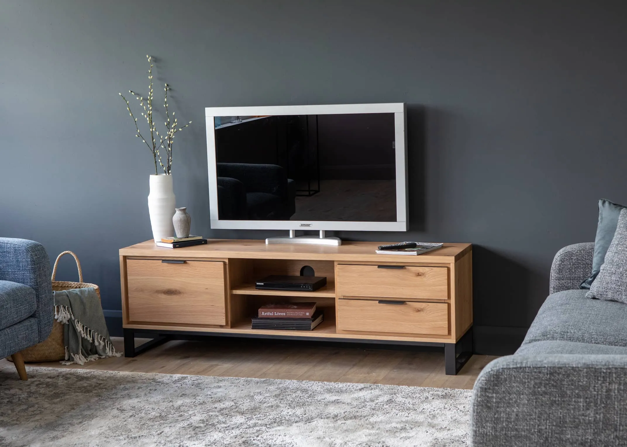 A lifestyle image of the Livorno tv unit with new york sofa & skyler rug.