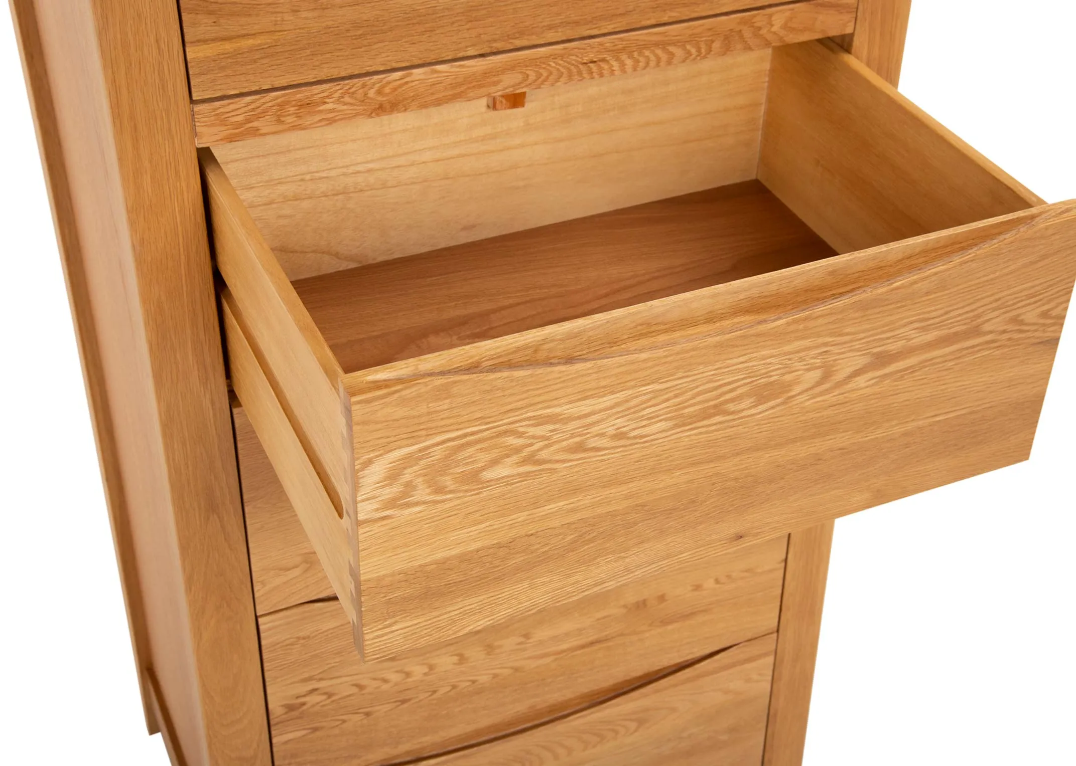 An oak tallboy with 2 over 4 drawers from EZ Livings Iris range. Closeup of soft close drawers