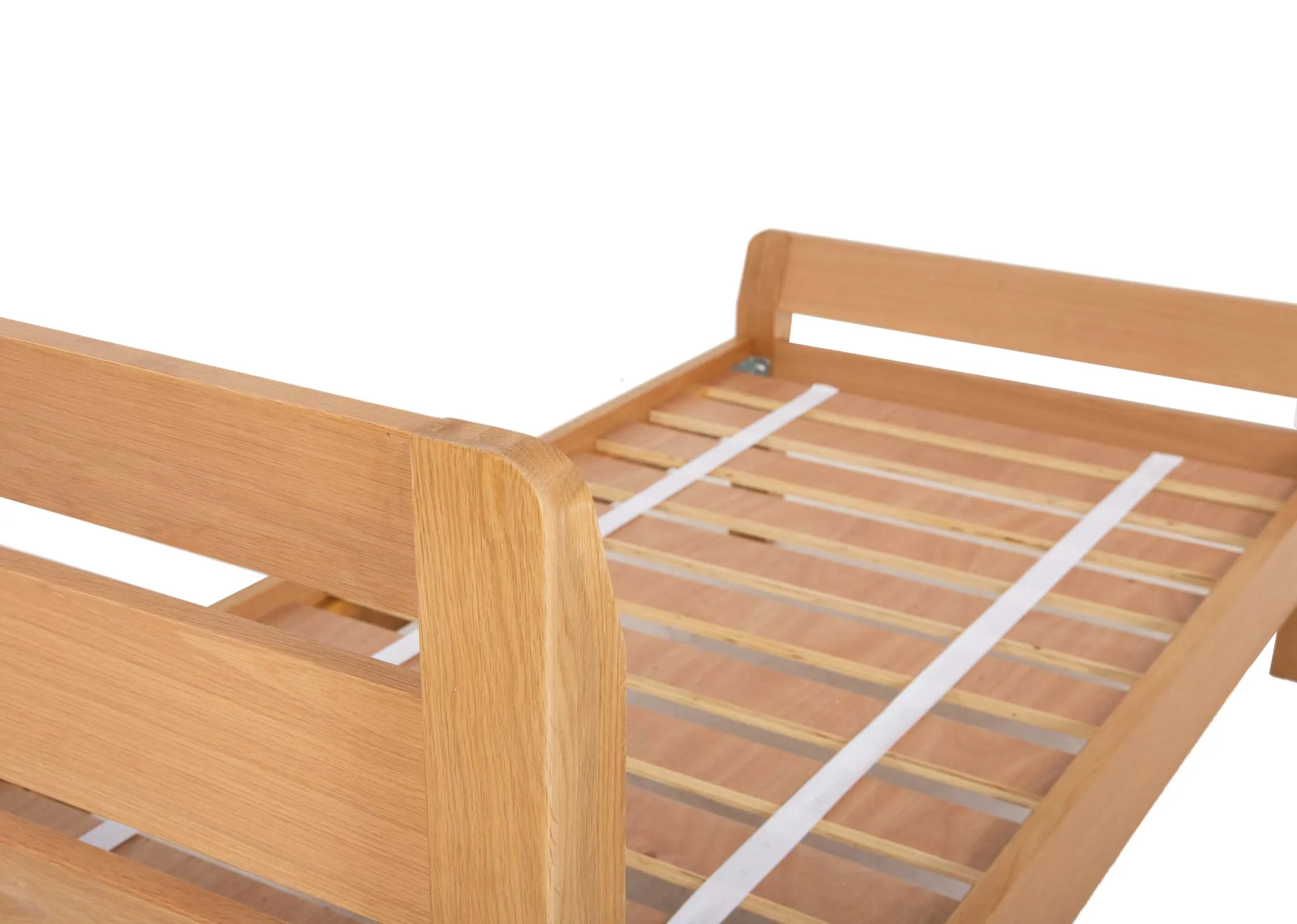 An oak 3ft single bedframe from EZ Livings Iris range. Angled closeup of slat wood base