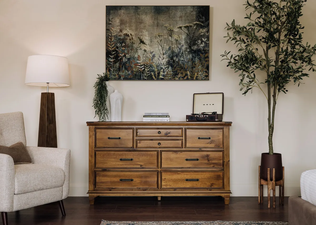 A lifetsyle image of the Allyson dresser with Fauna lamp and Fanciful canvas.