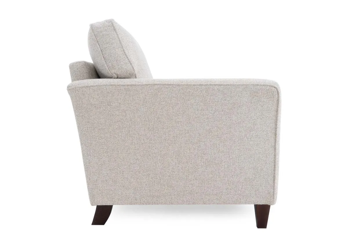 A cream fabric accent chair from EZ Livings Furniture Kilronan range. Side view of high arms
