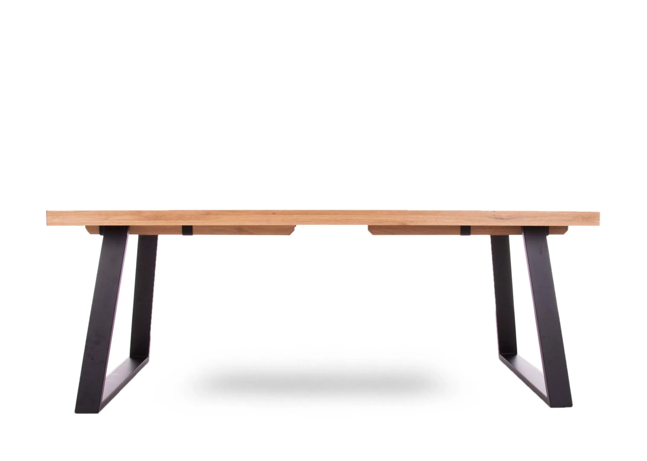 A 200cm oak dining table with metal legs from EZ Living Furniture's Renvyle range. Front view of table unextended