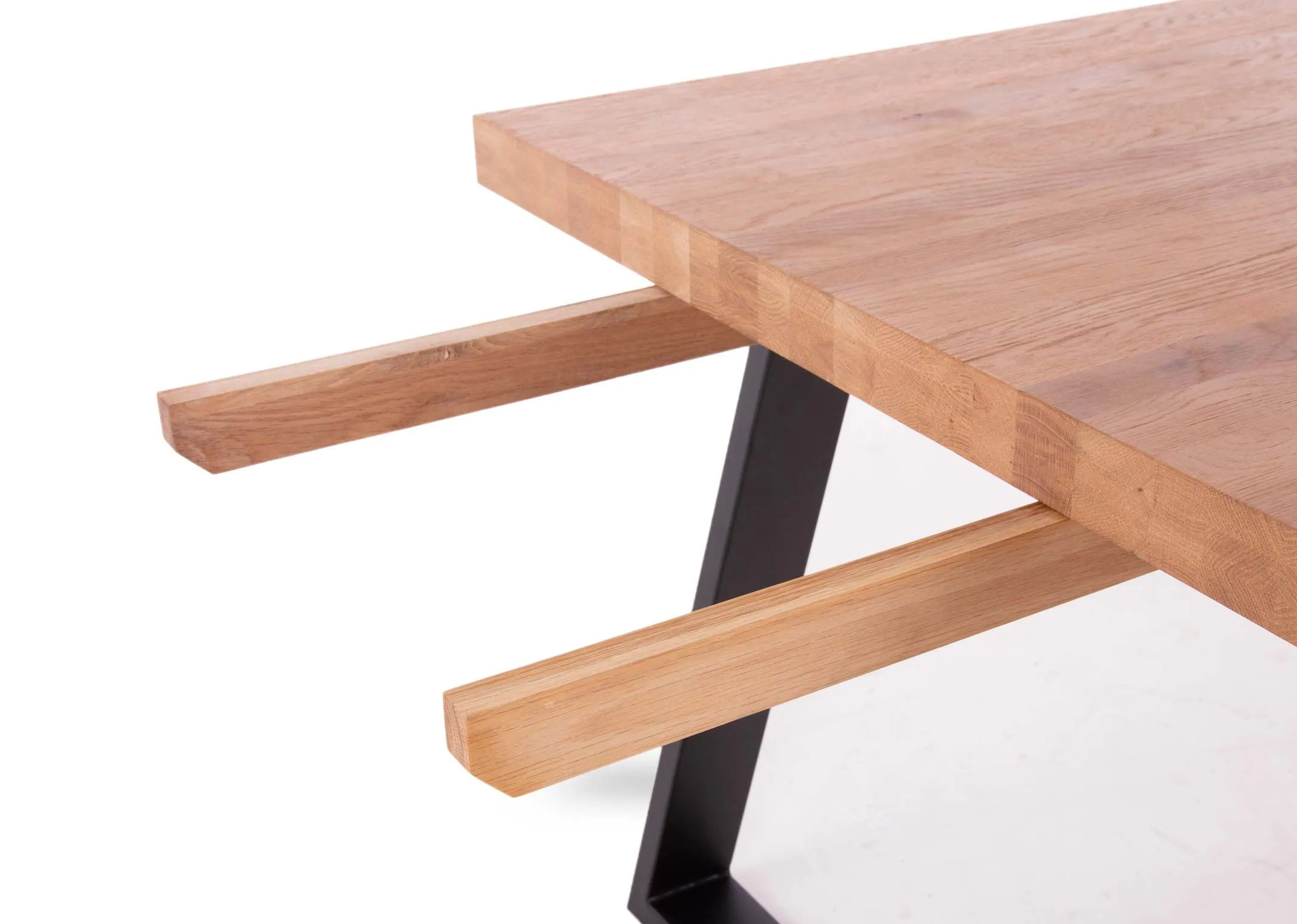 A 160cm oak dining table with metal legs from EZ Living Furniture's Renvyle range. Angled view of table with option to extend