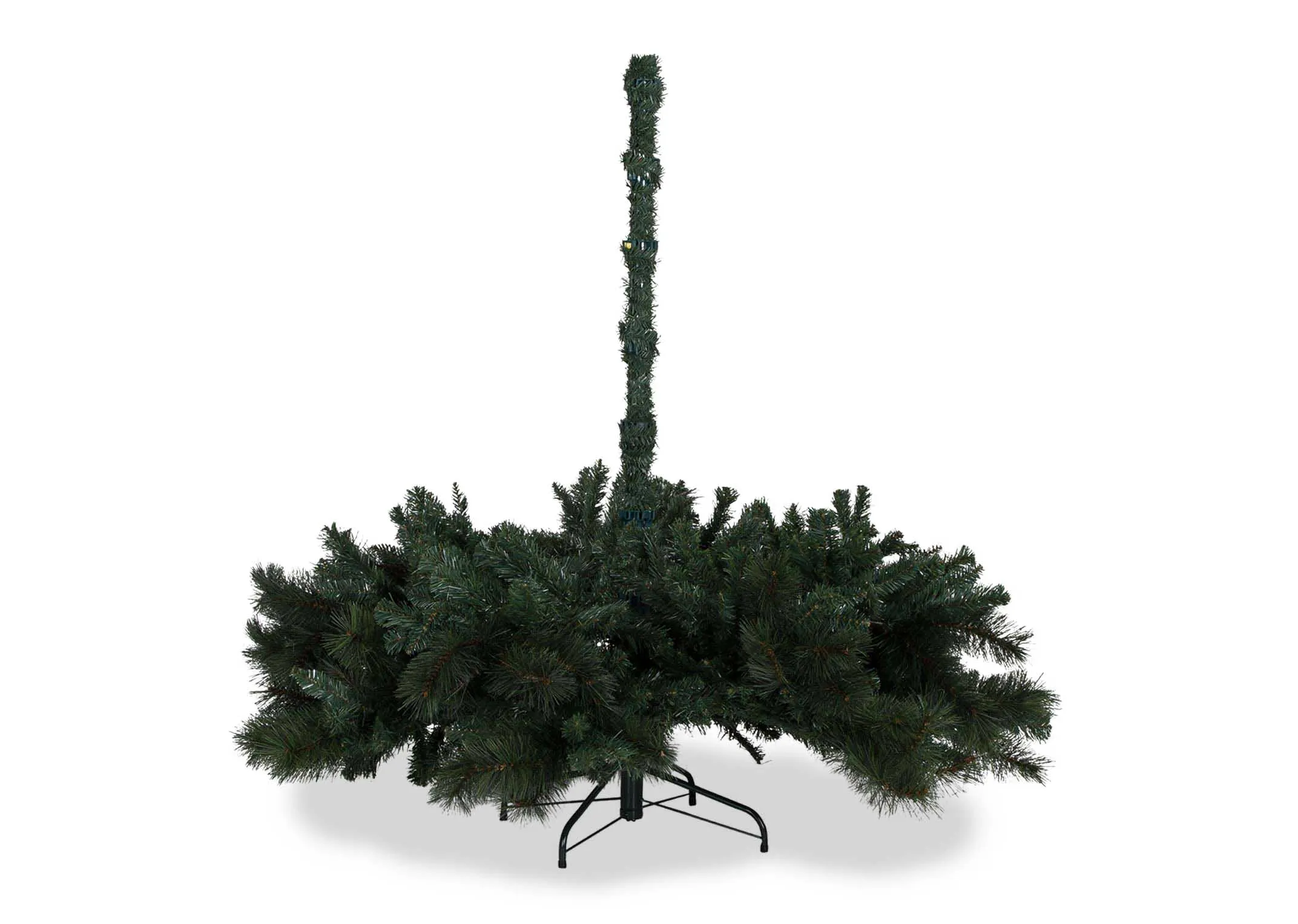 A 10ft mixed pine needle artificial Christmas tree from EZ Living's Sherwood range. Front view of assembly in process.
