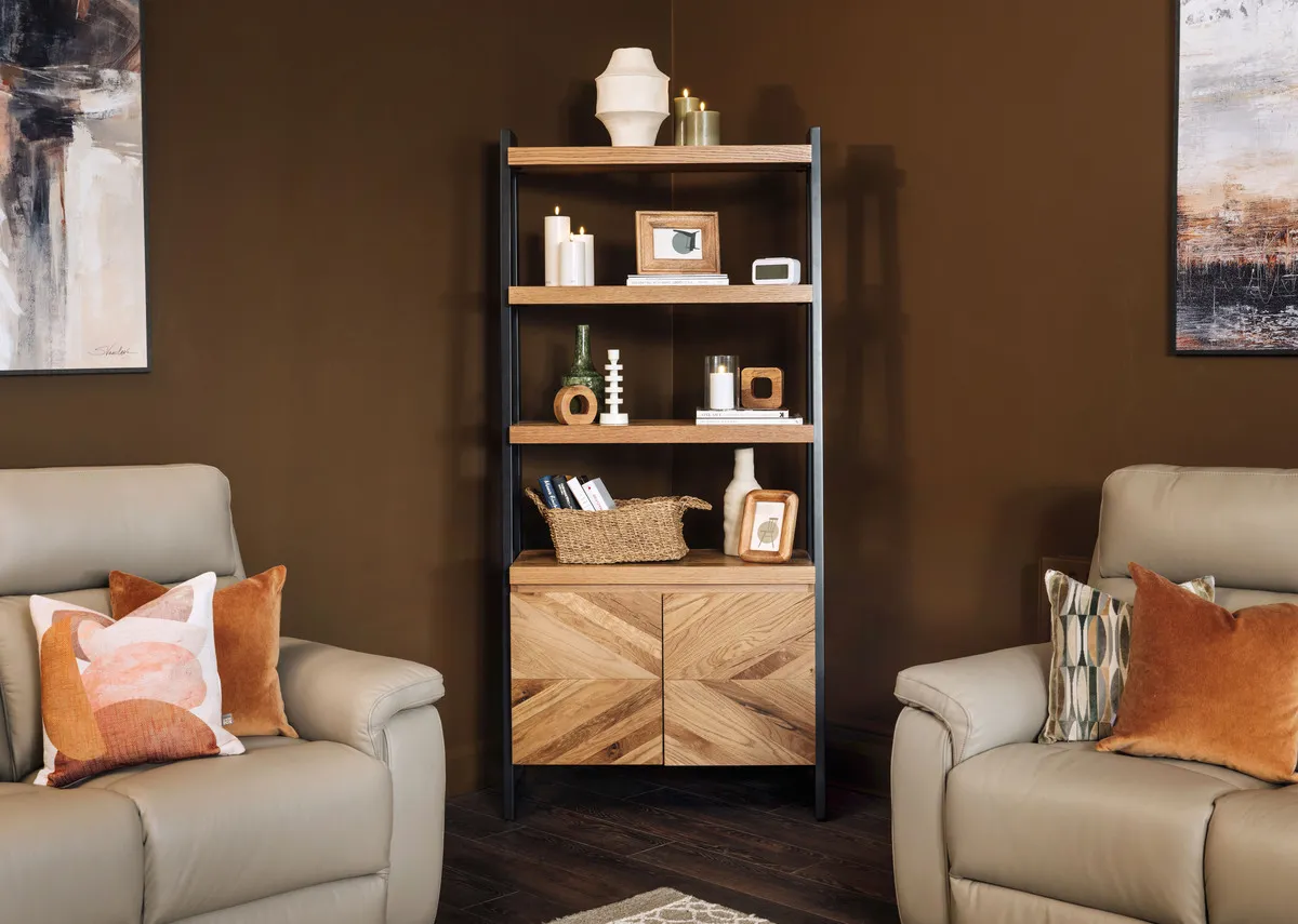 A lifestyle image of the Ellipse Display unit with Raven sofas and a selection of Light and living accessories