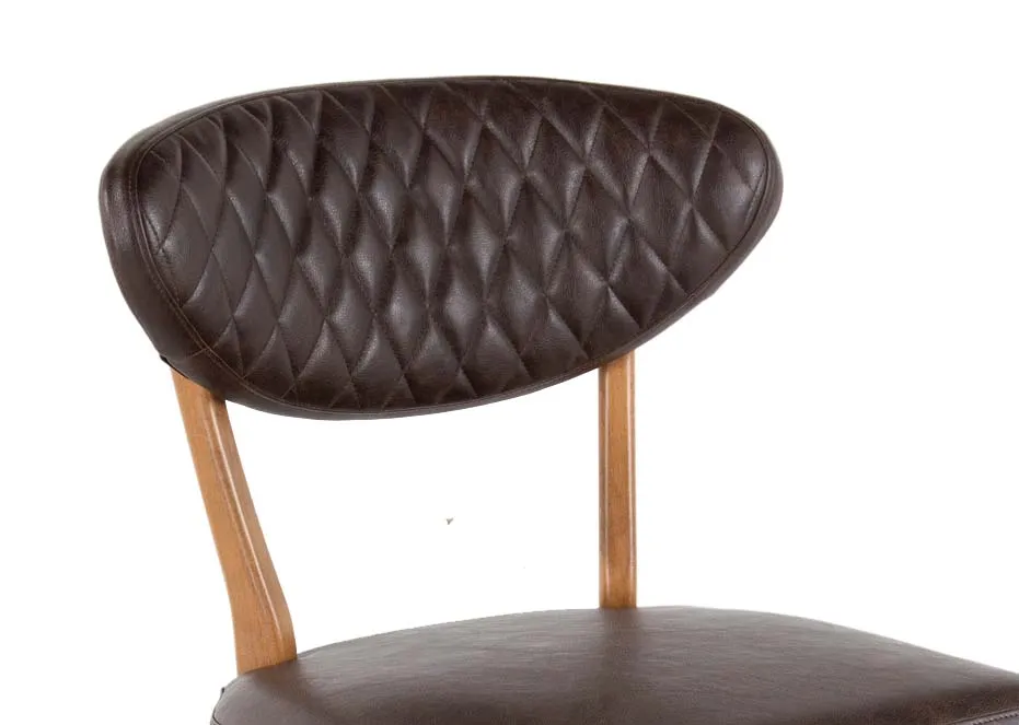 A brown faux leather & rustic oak frame dining chair from EZ Living's Margot range. Closeup of diamond texture fabric